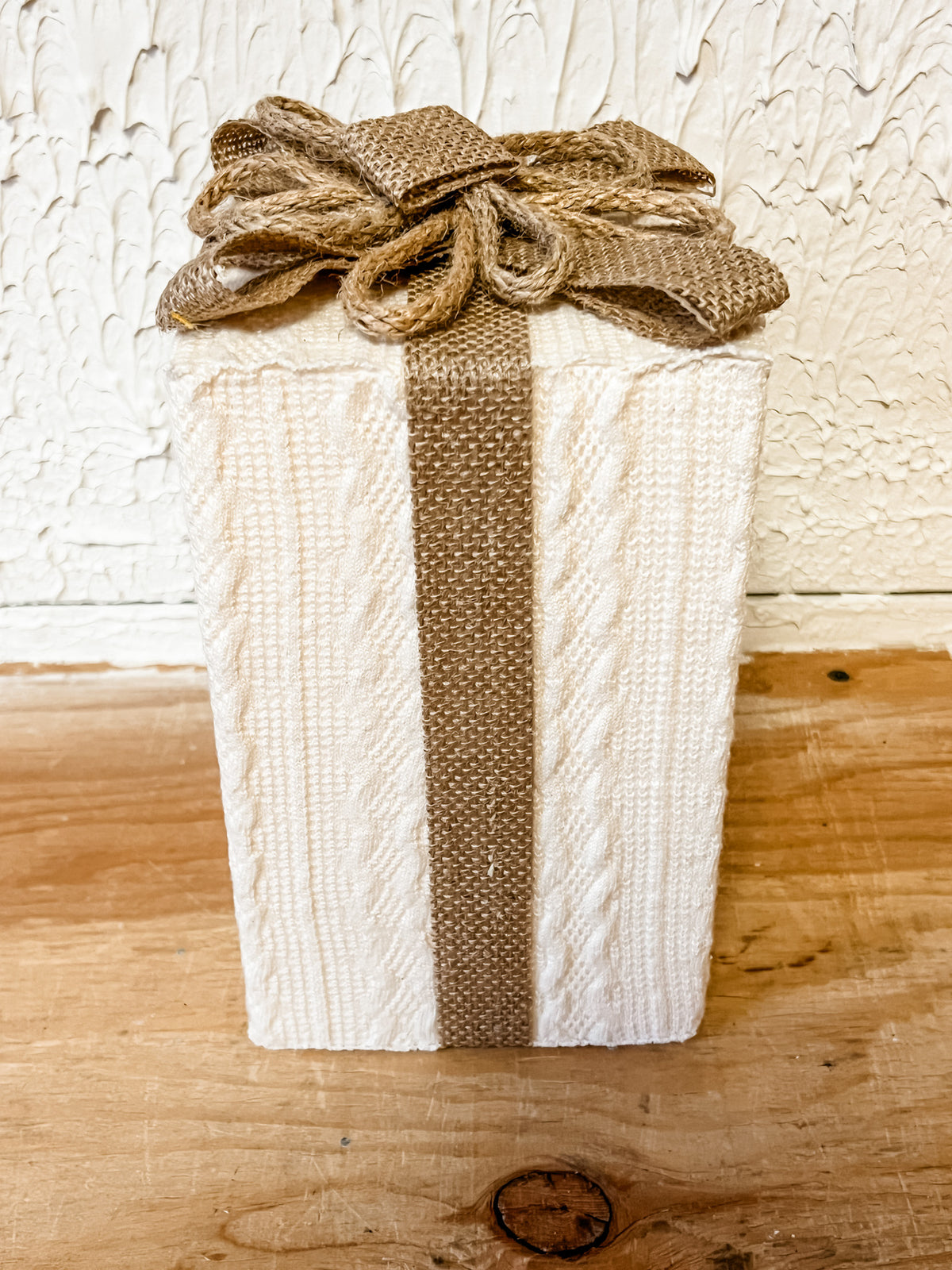rustic sweater and burlap ribbon wrapped presents at the rustic barn in killingworth ct
