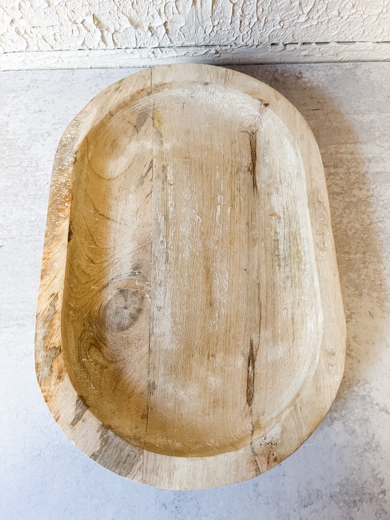 white washed oval wood tray at the rustic barn in killingworth ct
