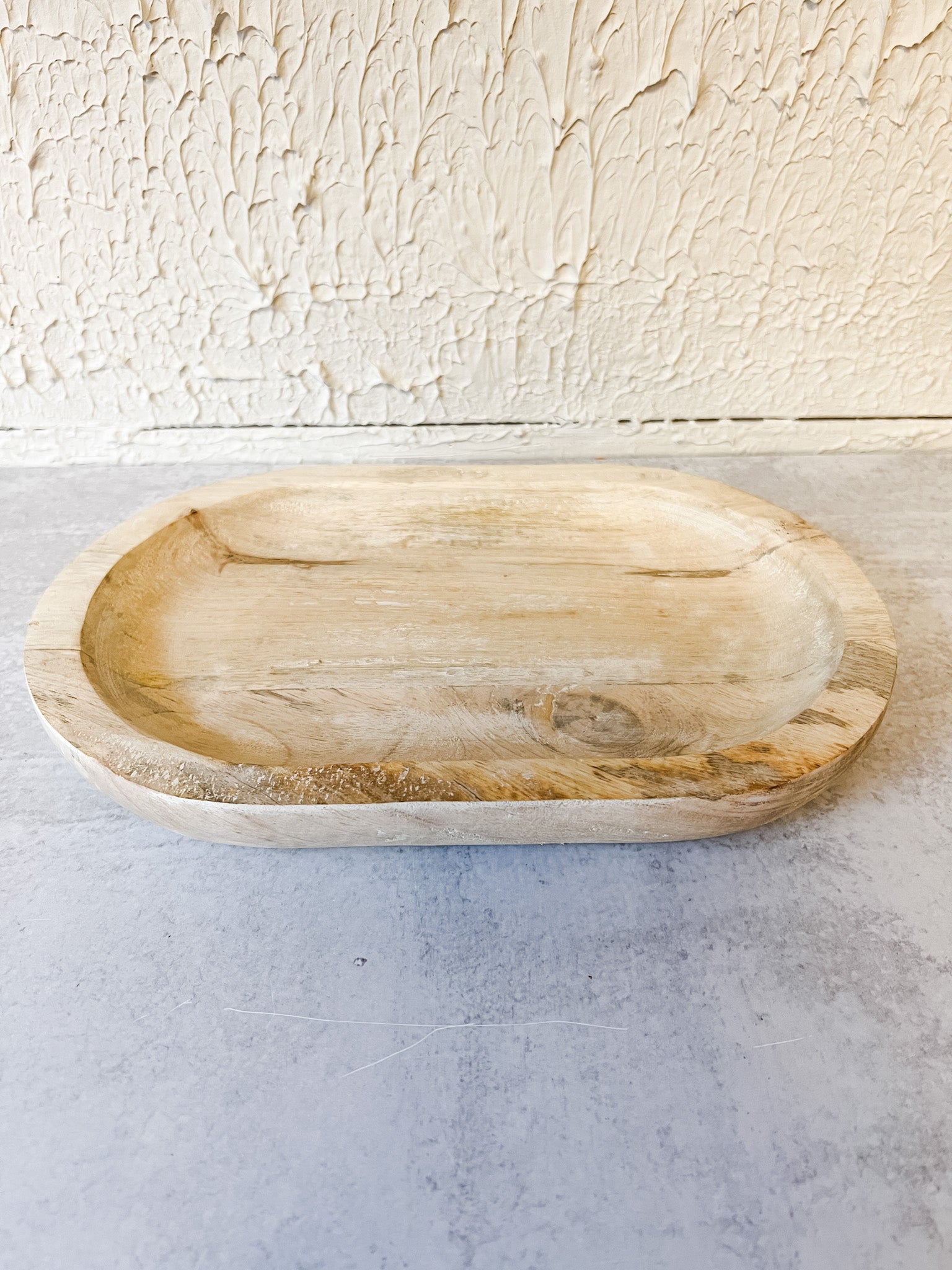 white washed oval wood tray at the rustic barn in killingworth ct