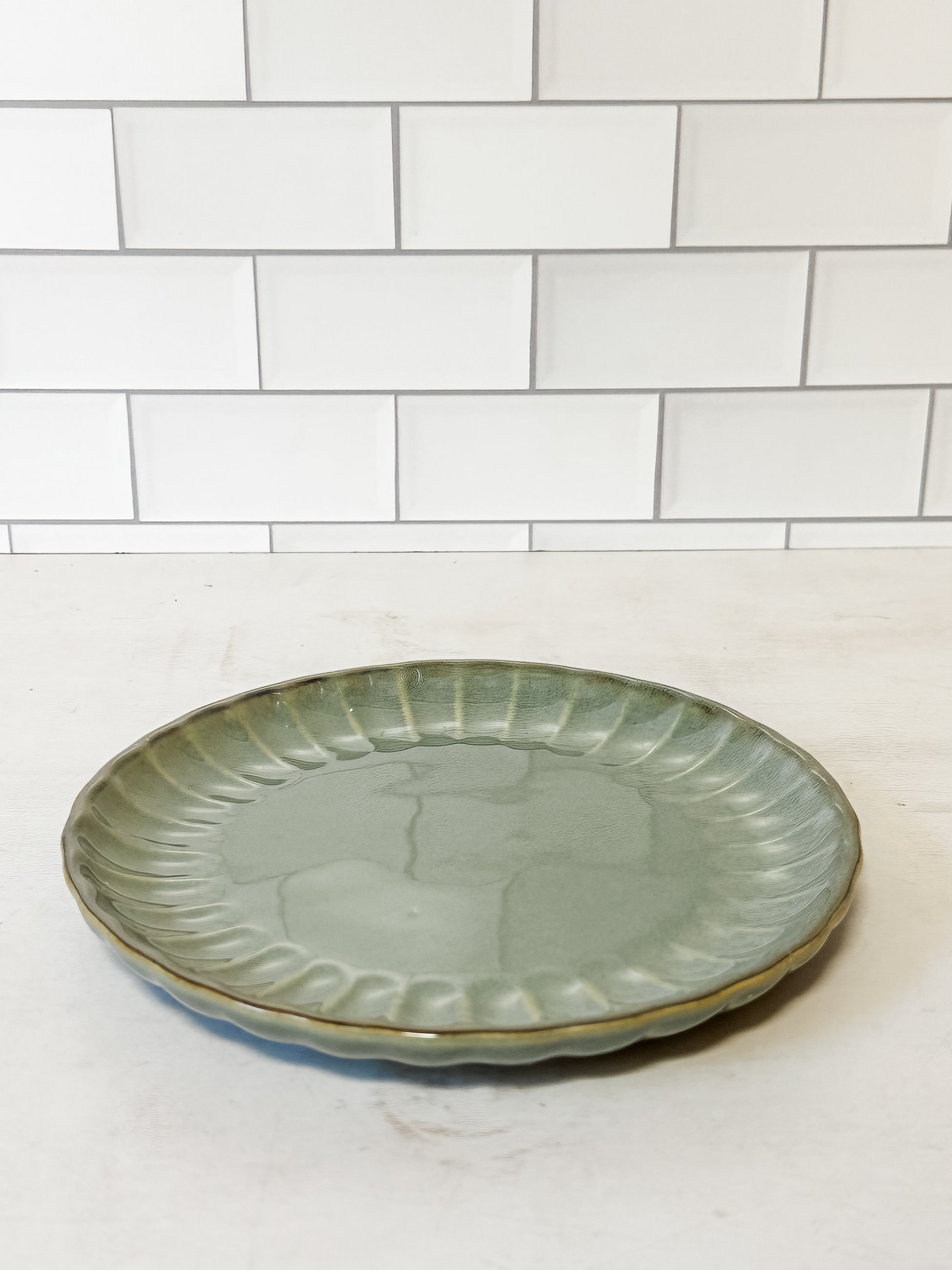 sage green stoneware fluted plate at the Rustic Barn in Killingworth CT