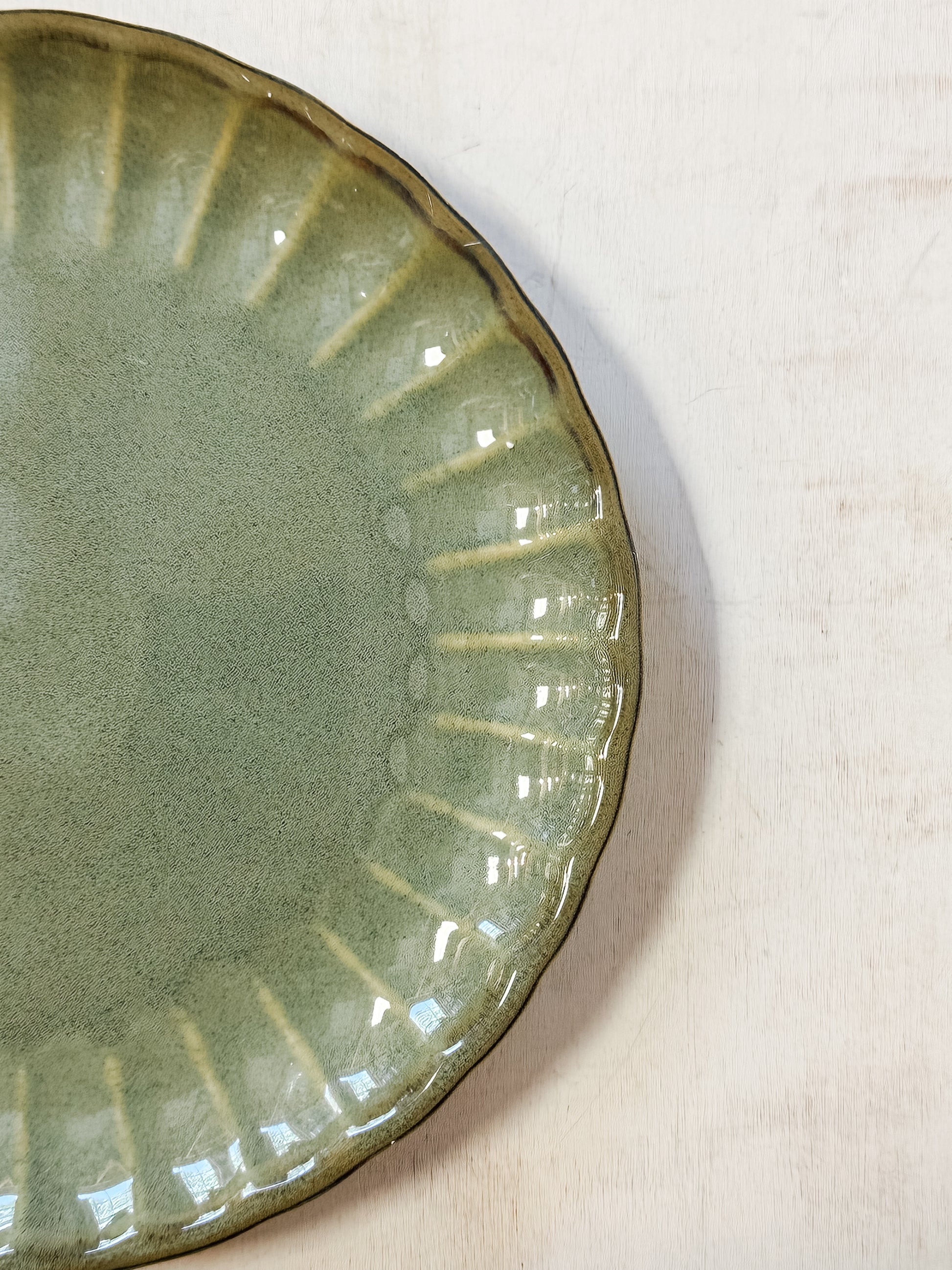 sage green stoneware fluted plate at the Rustic Barn in Killingworth CT