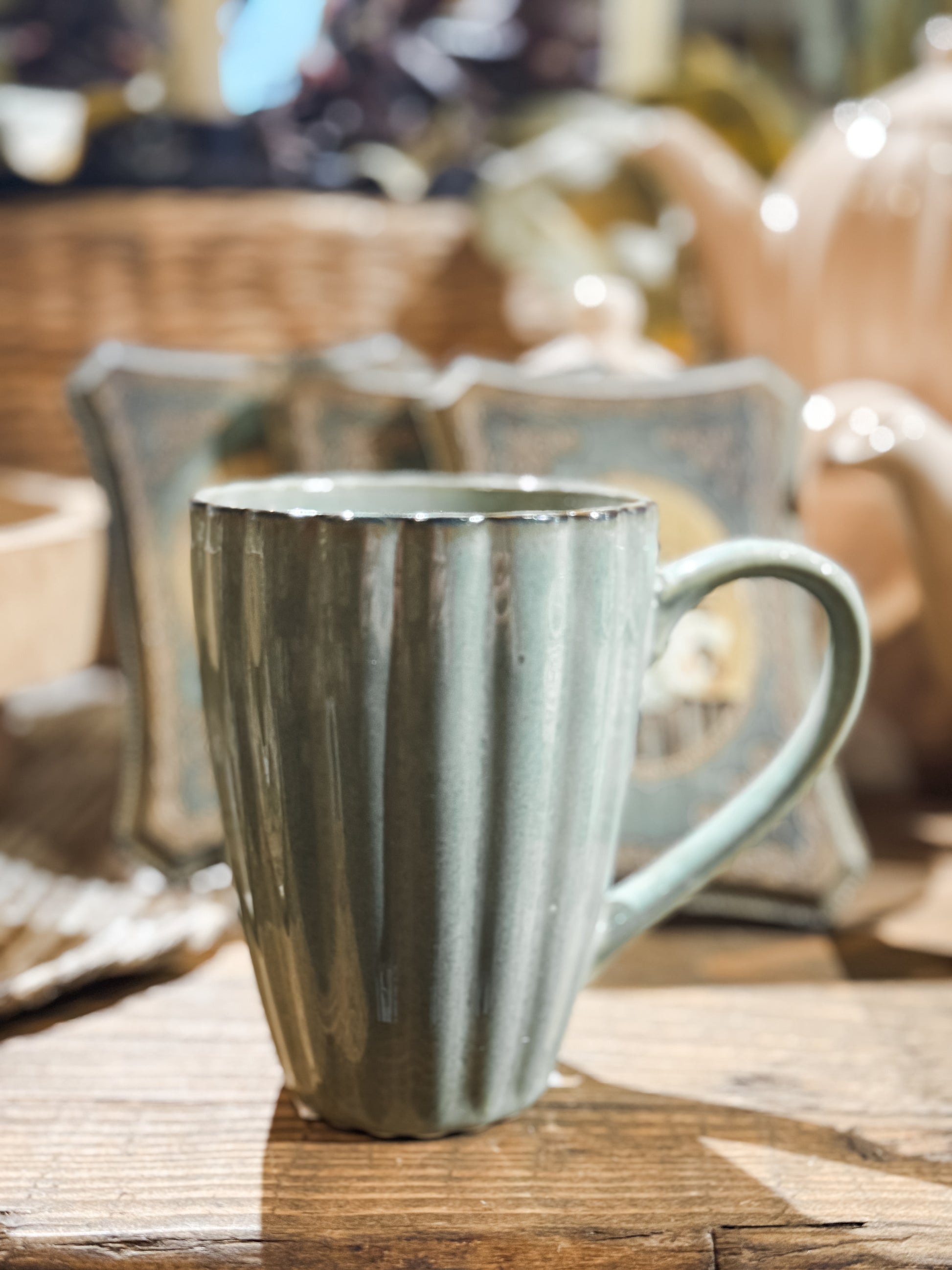 sage green stoneware ribbed mug at the Rustic Barn in Killingworth CT