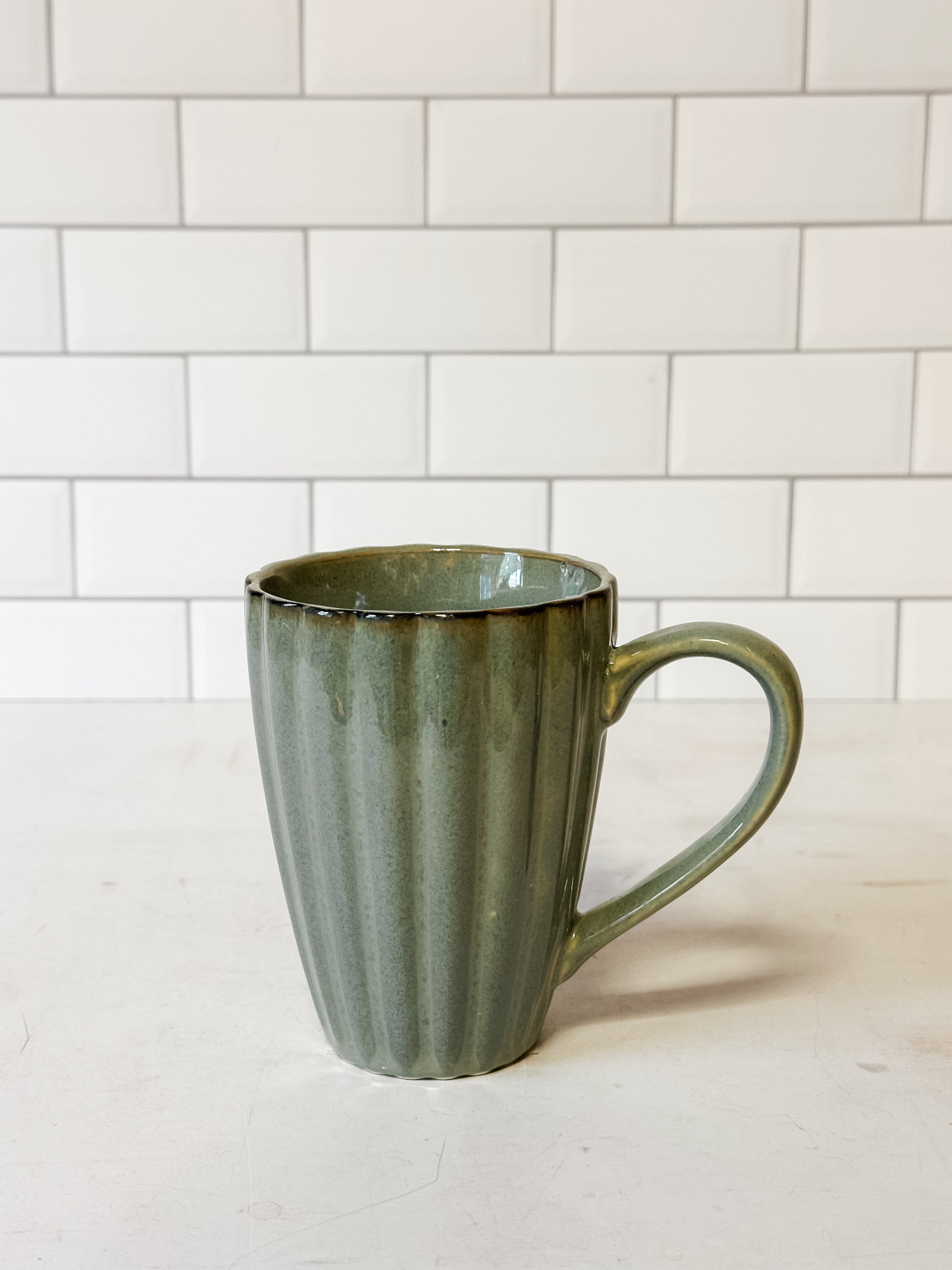 sage green stoneware ribbed mug at the Rustic Barn in Killingworth CT