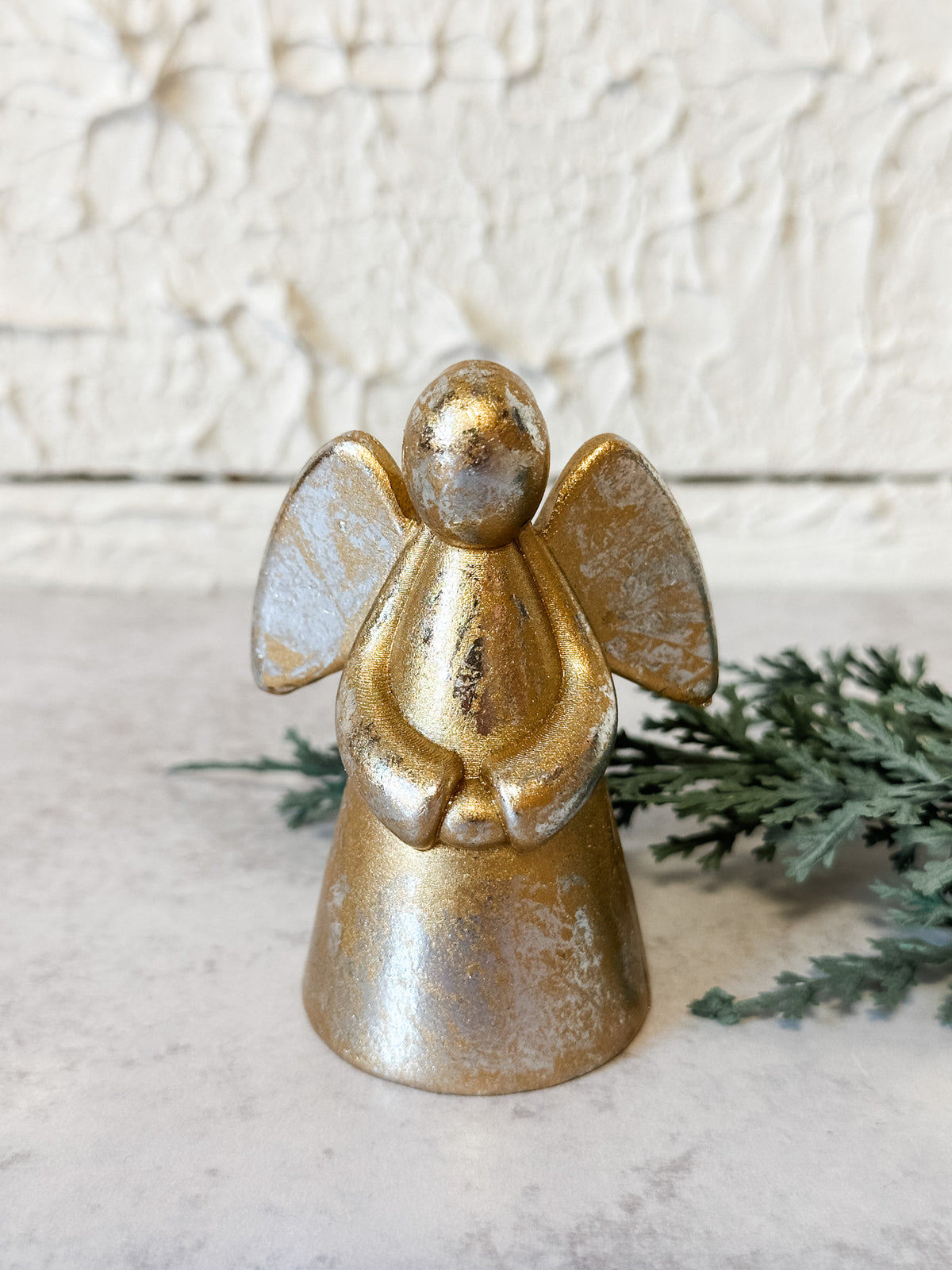 serene gold gilded angel figurine at the rustic barn in killingworth ct