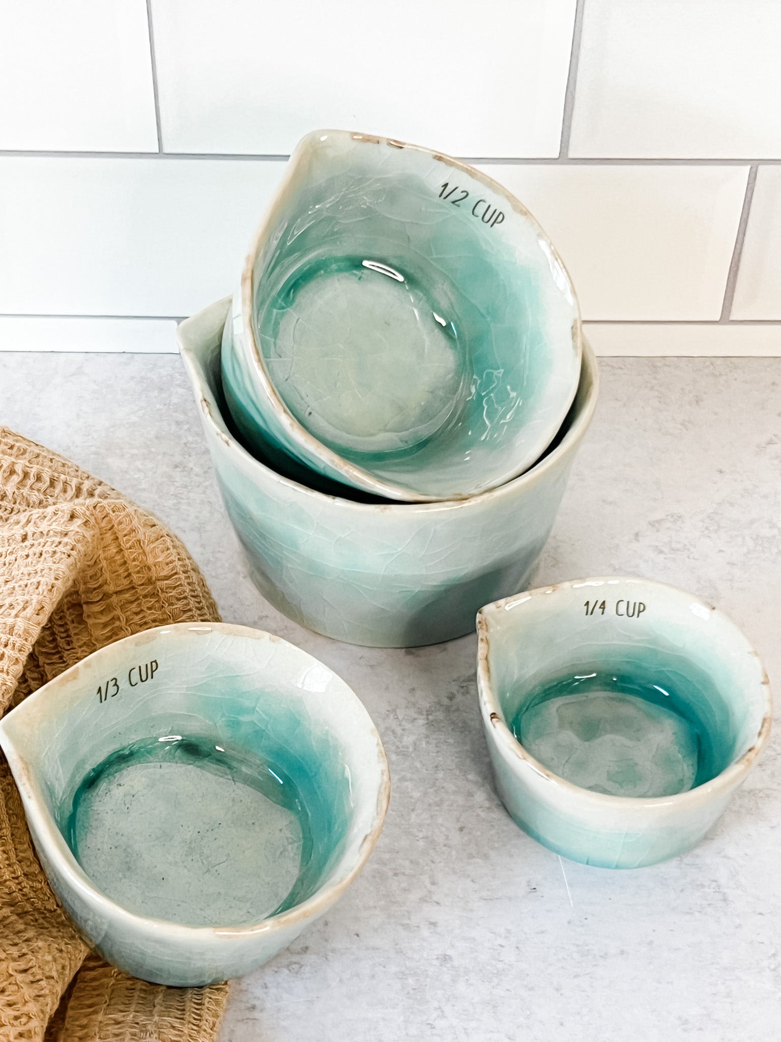 set of 4 stoneware measuring cups at the rustic barn in killingworth ct