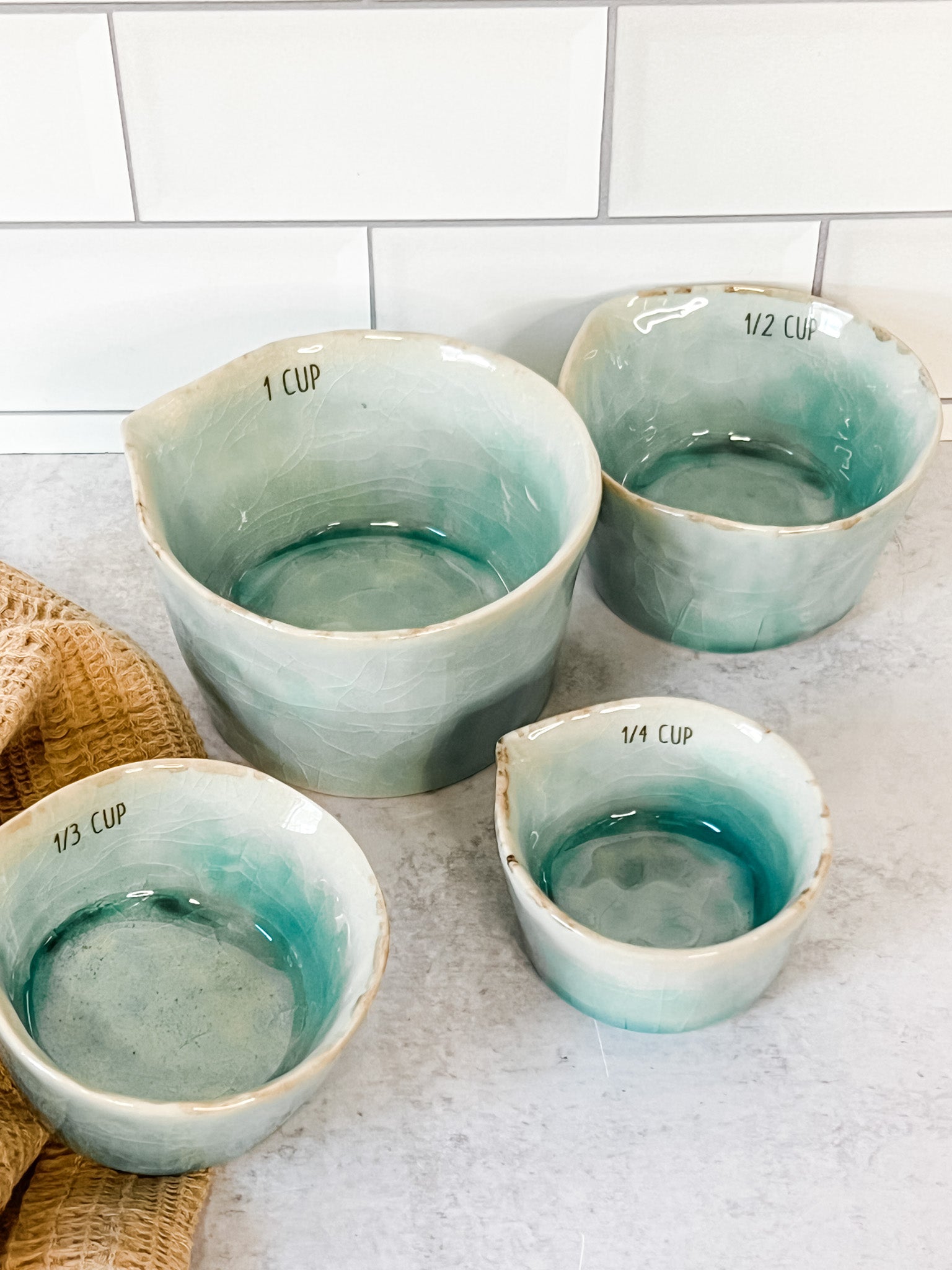 set of 4 stoneware measuring cups at the rustic barn in killingworth ct