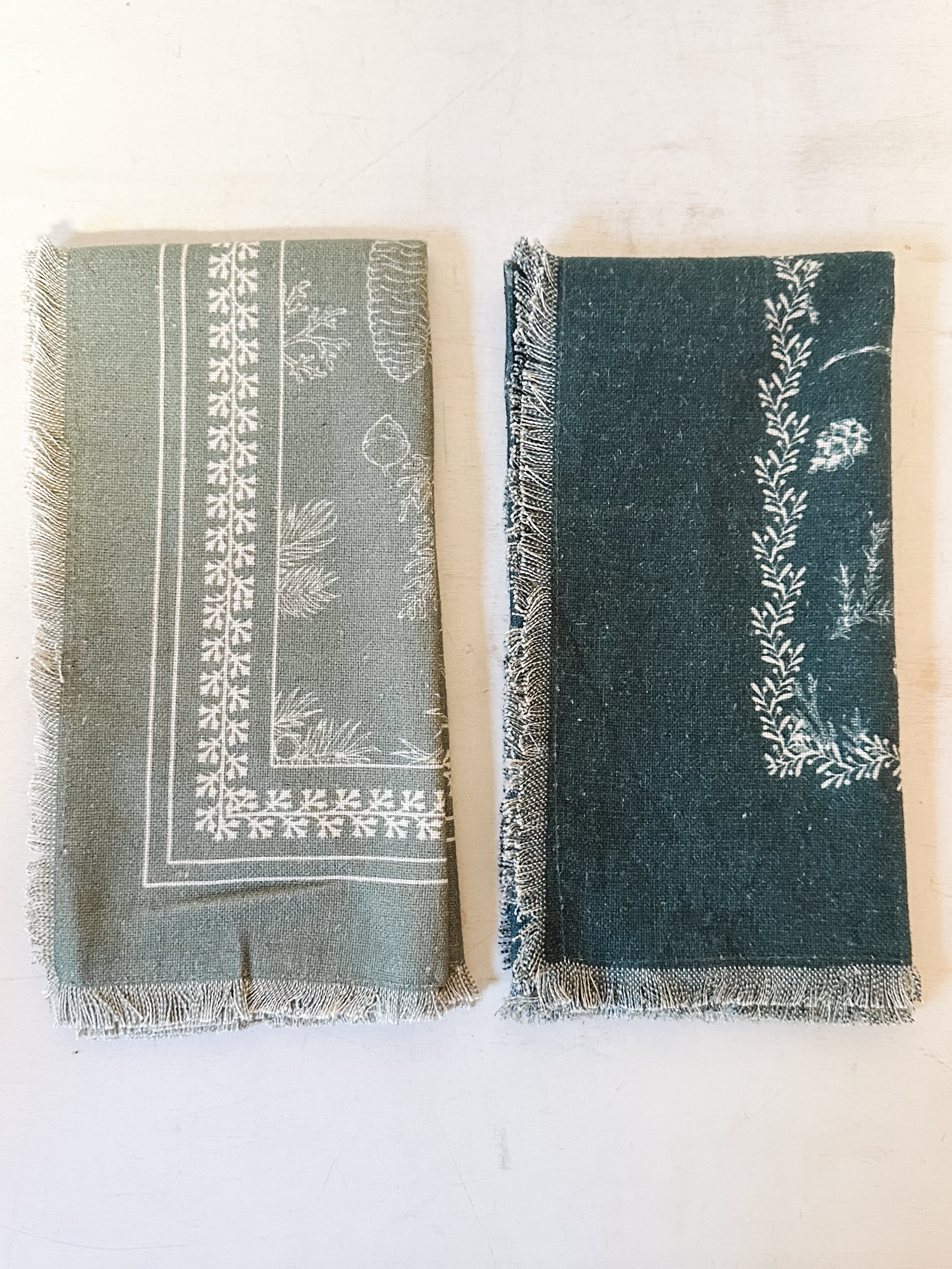 set of 4 cotton and linen napkins with pine bough pattern at the rustic barn in killingworth ct
