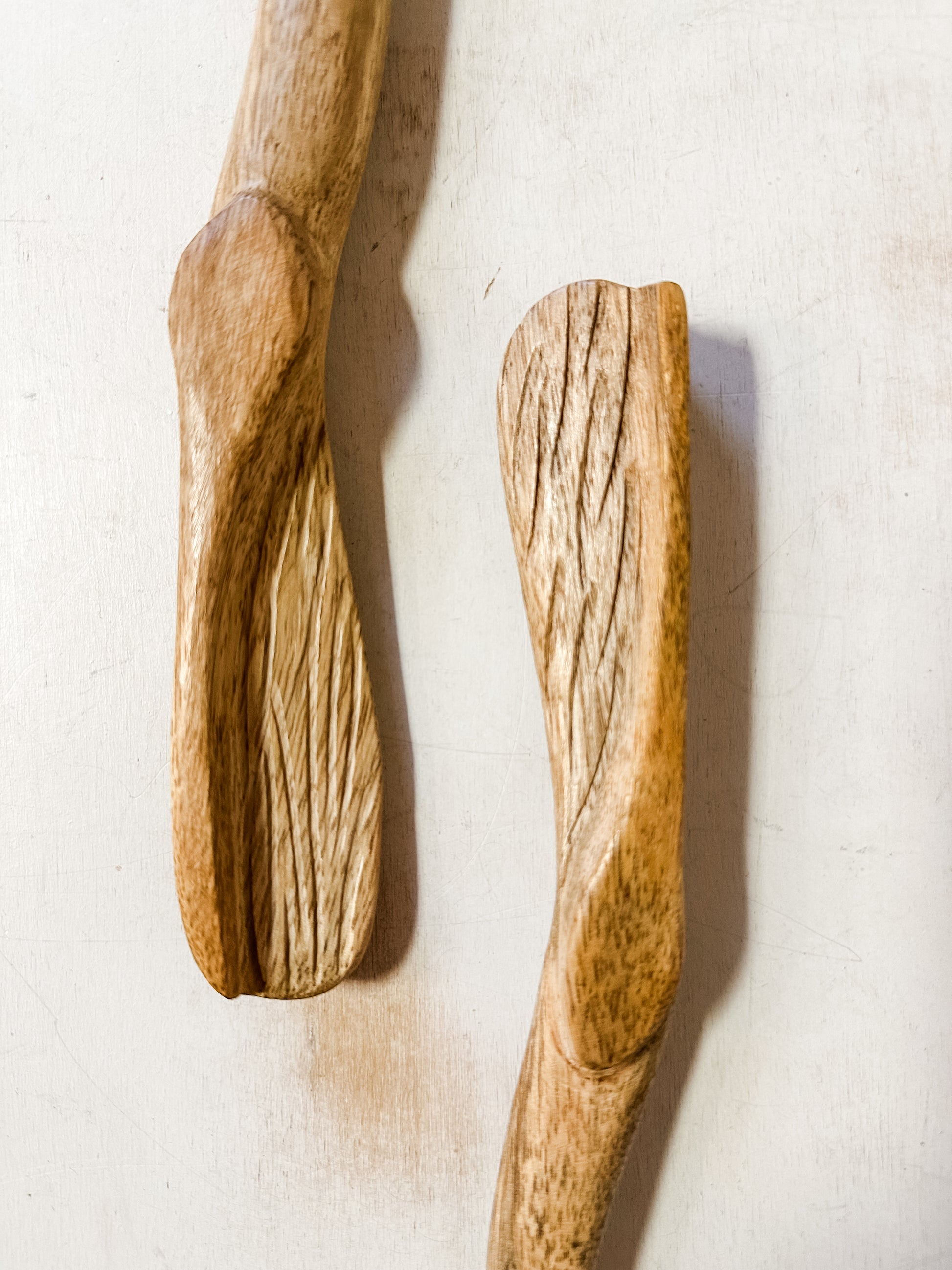 carved mango wood salad servers at The Rustic Barn in Killignworth CT