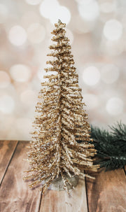 Shimmering natural wood alpine gold sparkly vintage trees for sale at the rustic barn in Killingworth, CT for christmas 