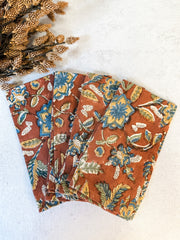 Sienna orange floral printed cotton and linen napkins for sale at the rustic barn in killingworth, CT