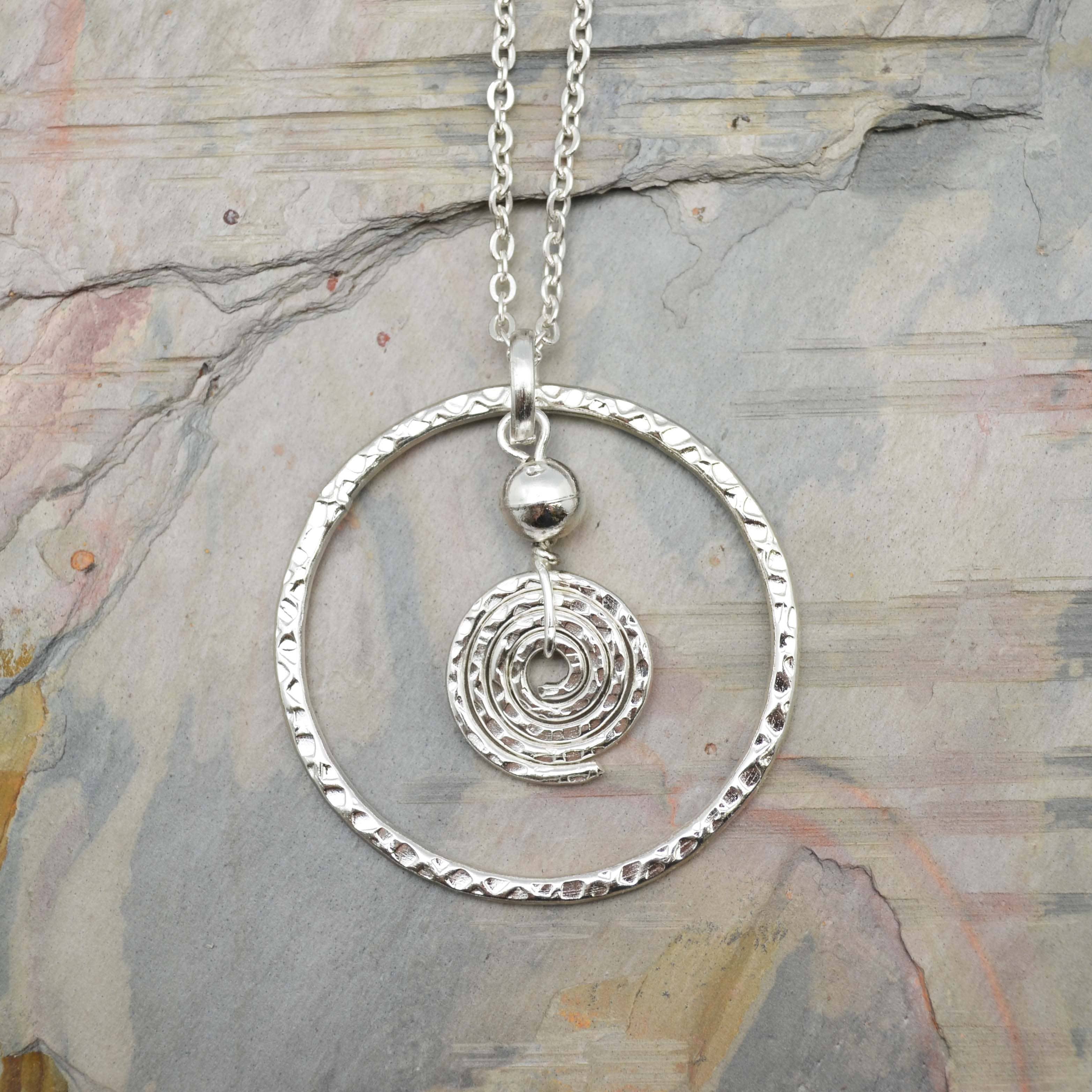 silver plated pendant necklace circle and spiral at the rustic barn in killingworth ct
