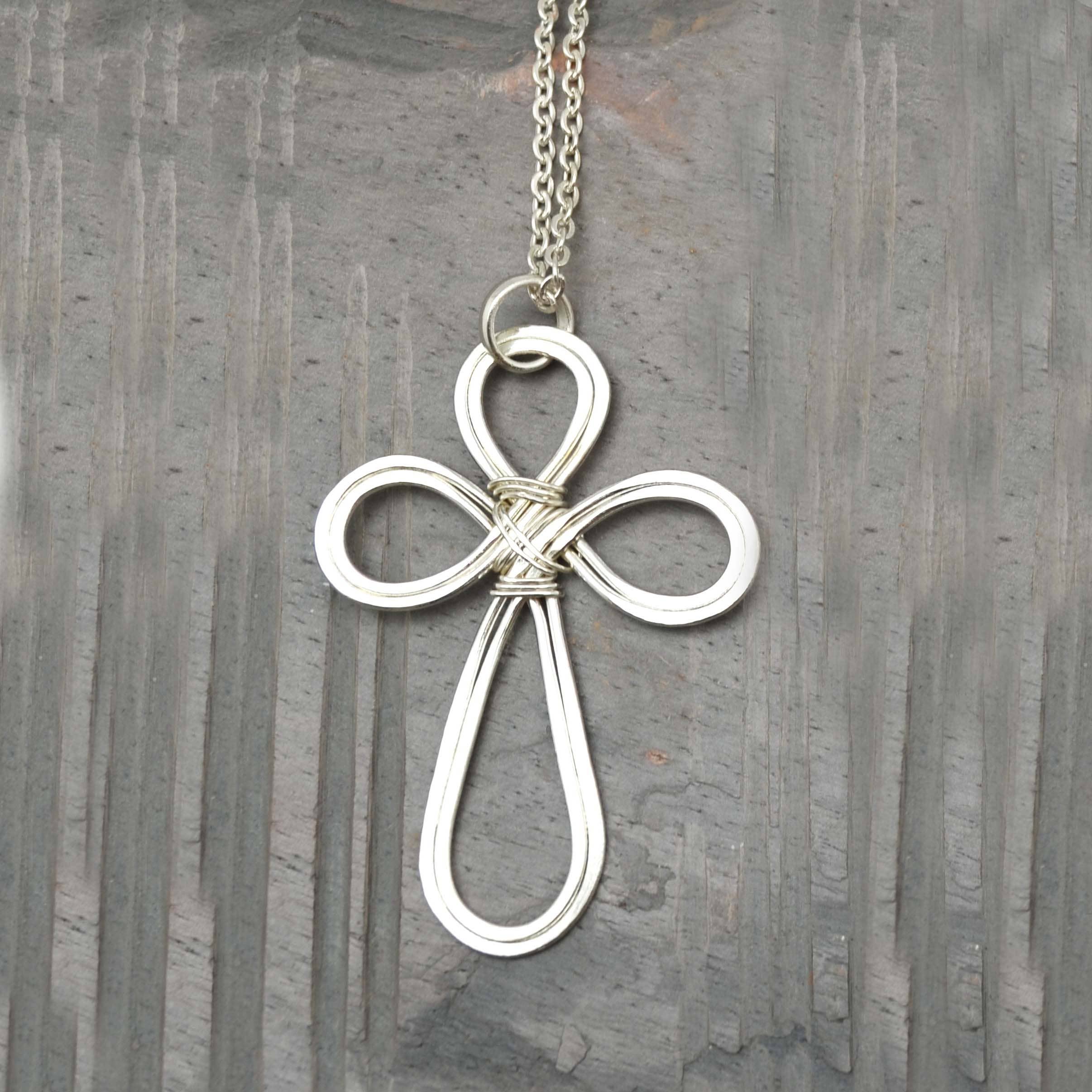 silver plated looped cross necklace at the rustic barn in killingworth ct
