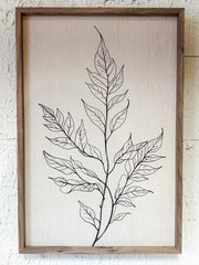 single branch with full leaves wooden wall decor at the Rustic Barn in Killingworth, CT