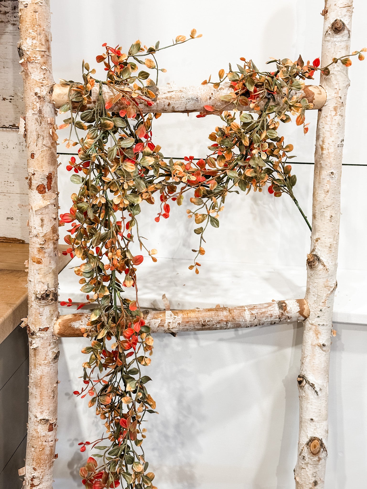 red and green bog pimpernel 6 feet fall garland at the rustic barn in killingworth ct