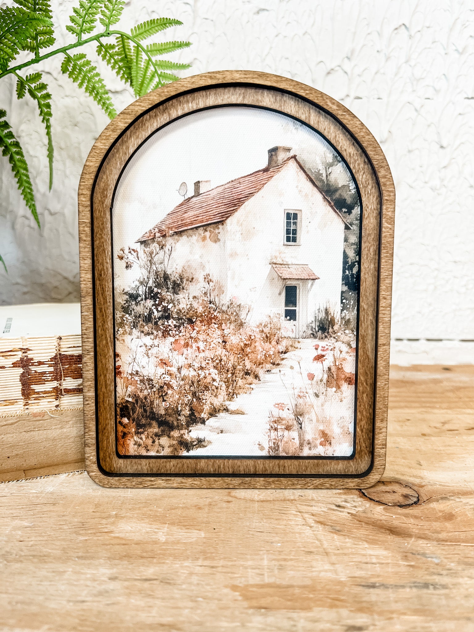 small arched wood framed cottage print at the rustic barn in killingworth ct