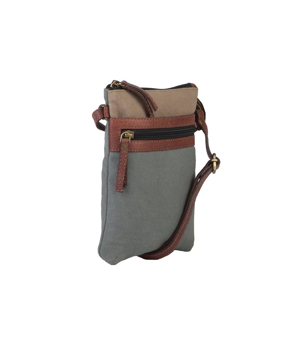 small gray crossbody bag with. brown strap at the rustic barn in Killingworth ct
