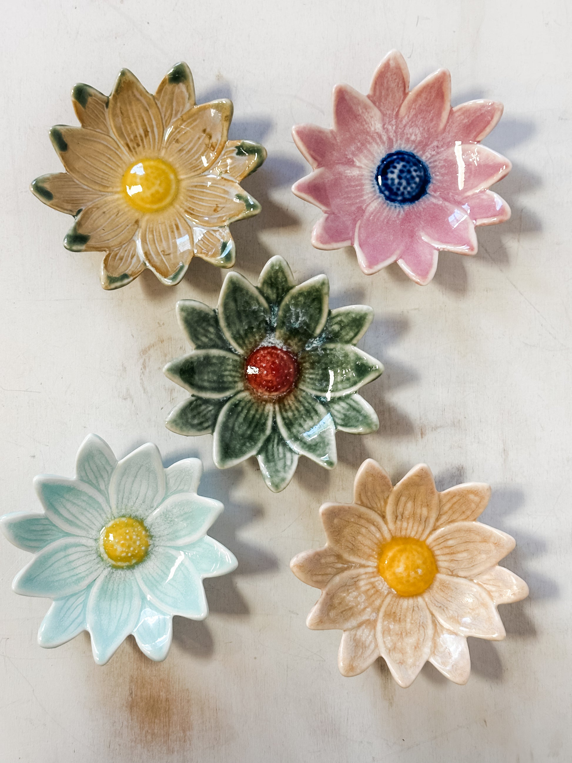 small stoneware flower shaped dishes at The Rustic Barn in Killingworth CT