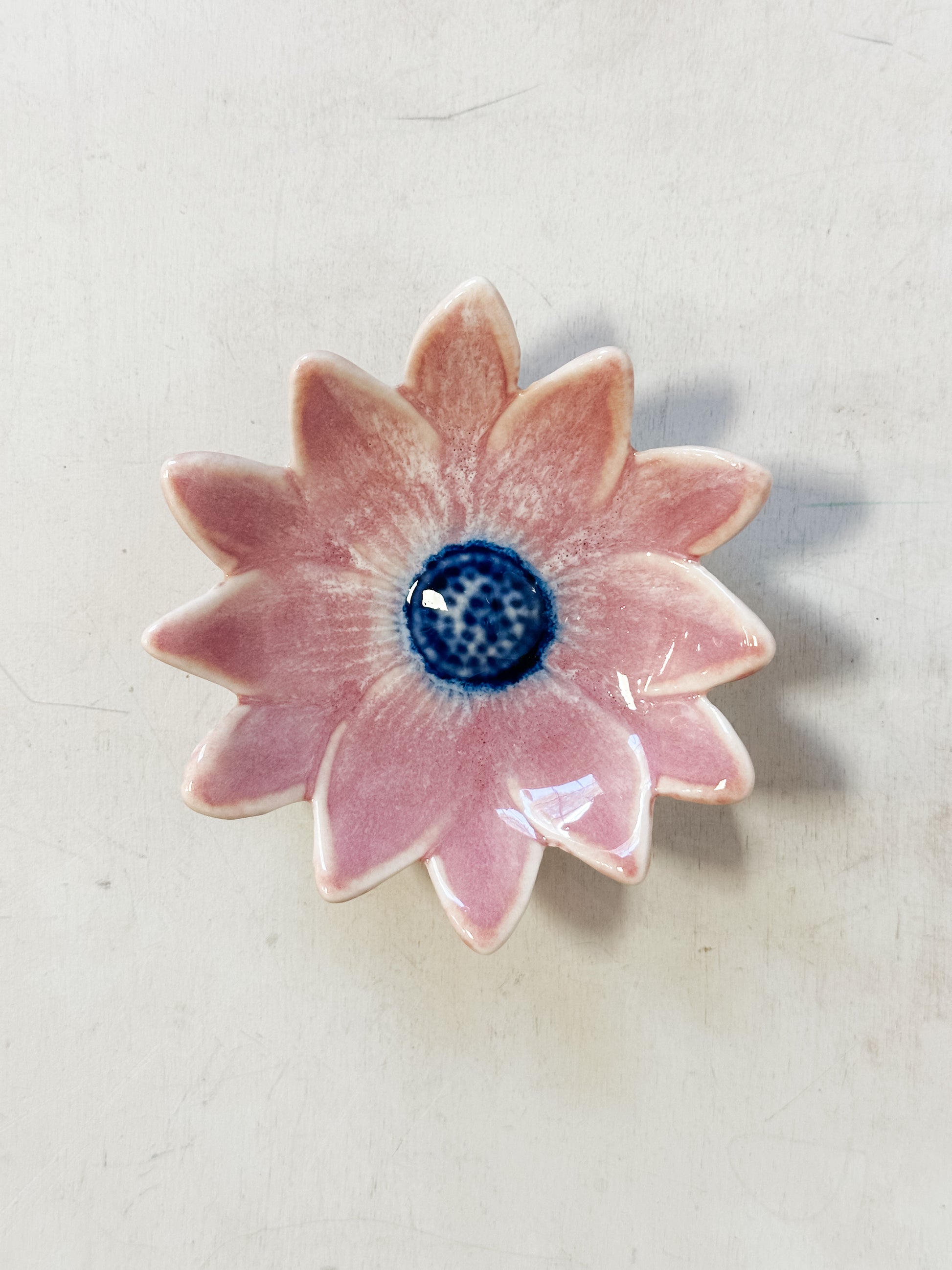 small pink stoneware flower shaped dishes at The Rustic Barn in Killingworth CT