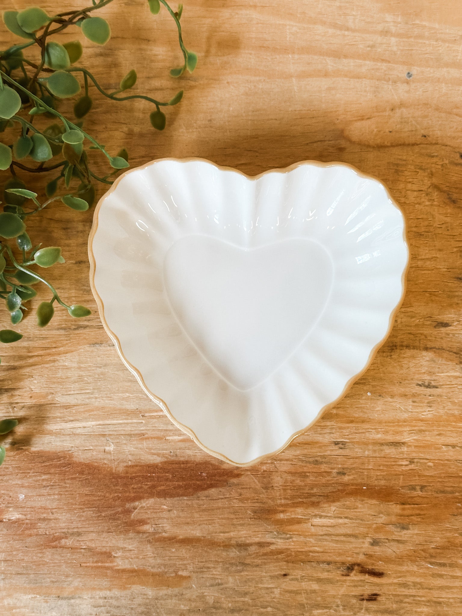 small white ceramic heart shaped trinket dish at the rustic barn in killingworth ct