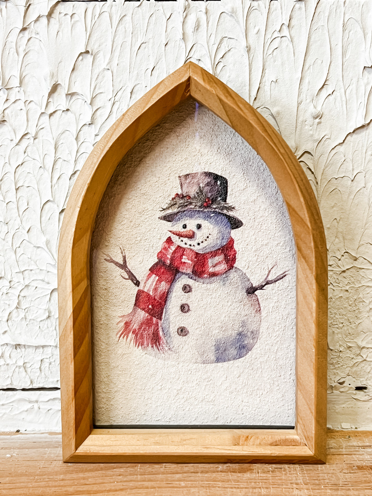 snowman framed wood tabletop sign at the rustic barn in killingworth ct