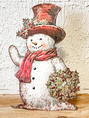 metal snowman stand up board christmas decor at the rustic barn in killingworth ct