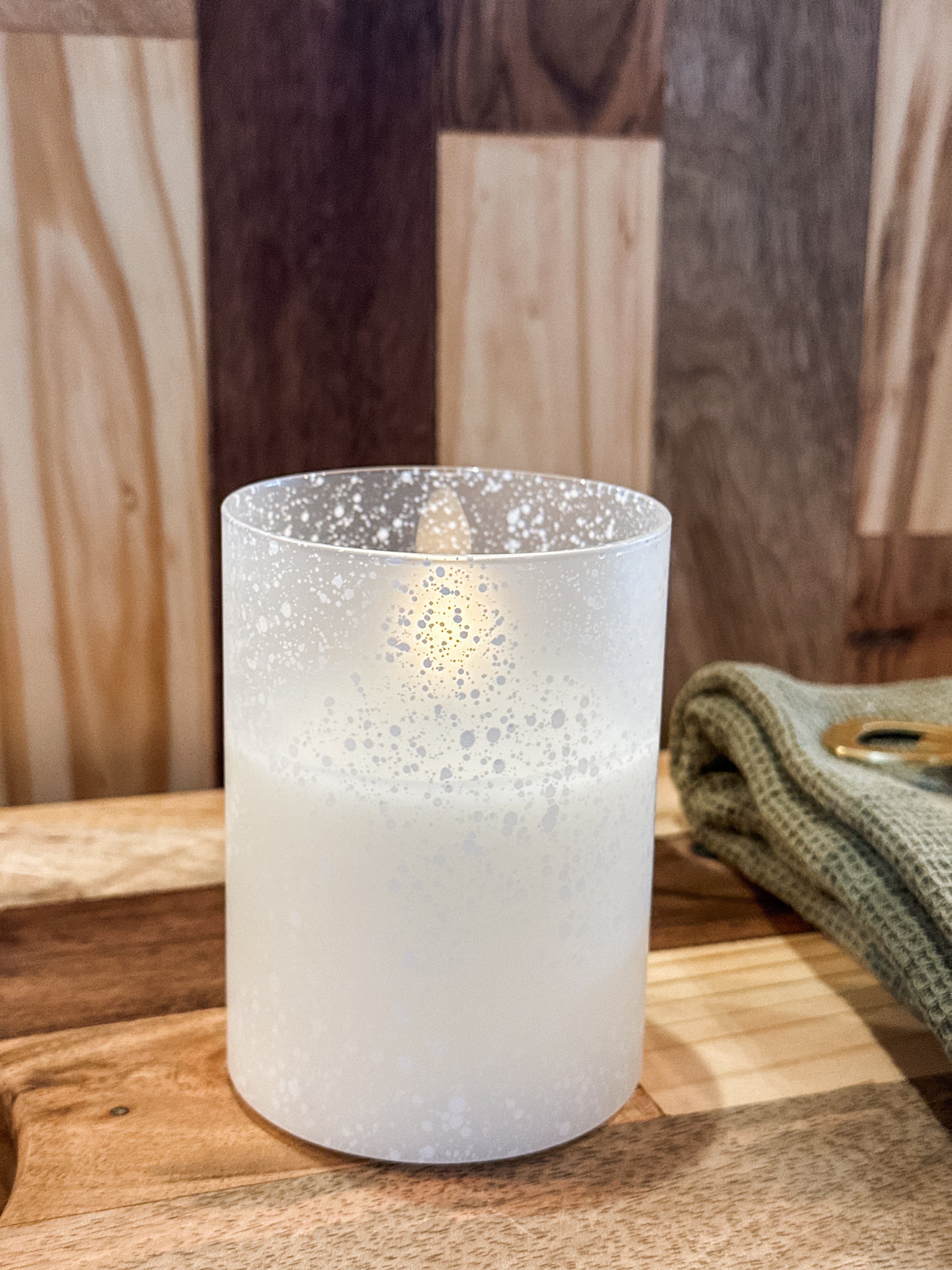 4 inch snowy glass flameless candle at The Rustic Barn in Killingworth CT