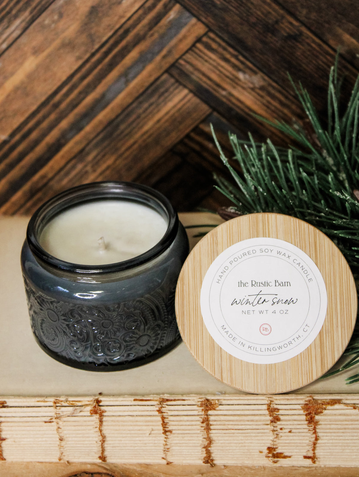 eucalyptus, cypress, and tonka bean hand-poured soy candle in 4 oz gray jar at The Rustic Barn in Killingworth CT