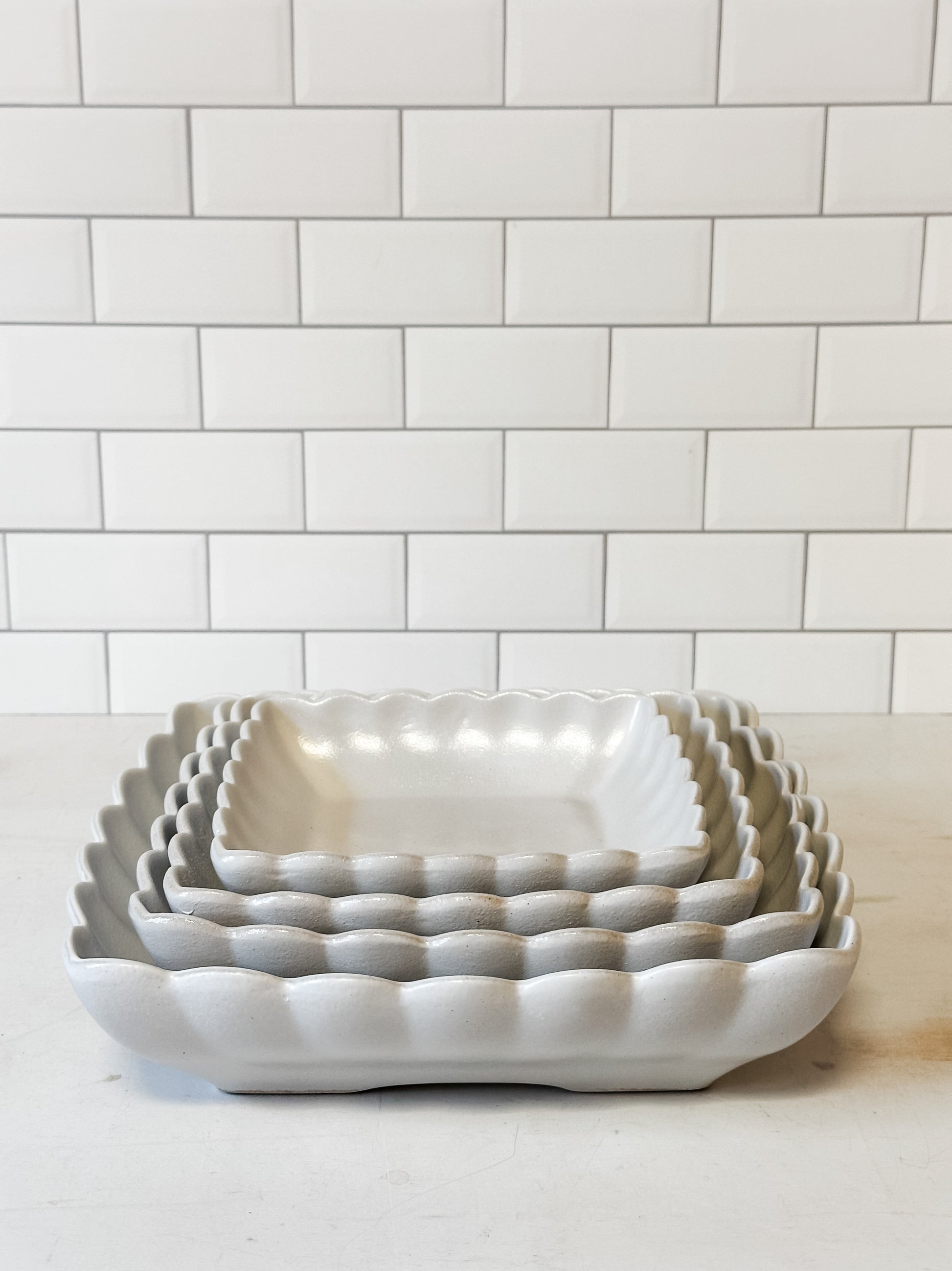 white square stoneware bowls with scalloped edge at The Rustic Barn in Killingworth CT