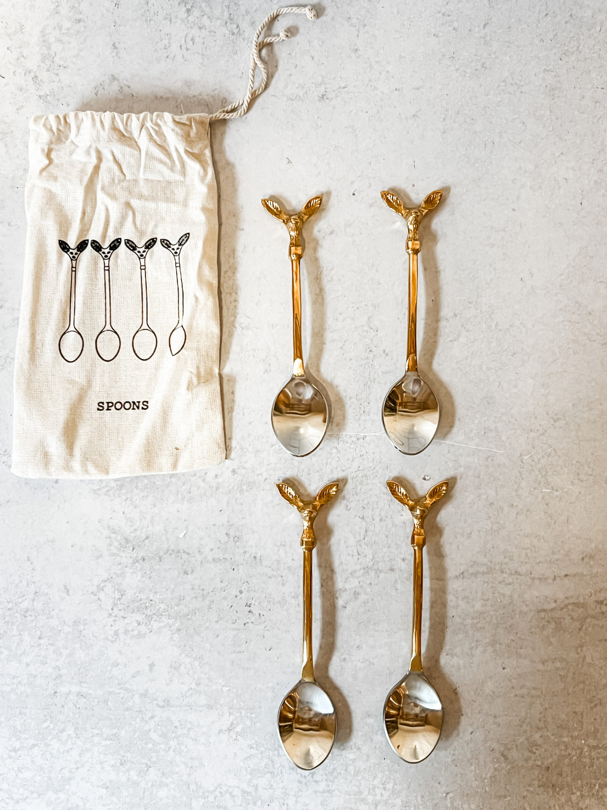 stainless steel and brass coffe spoons with deer head set of 4 at the rustic barn in killingowrth ct