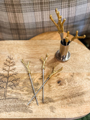stainless steel holder and eight appetizer picks with brass antler handles at The Rustic Barn in Killingworth CT