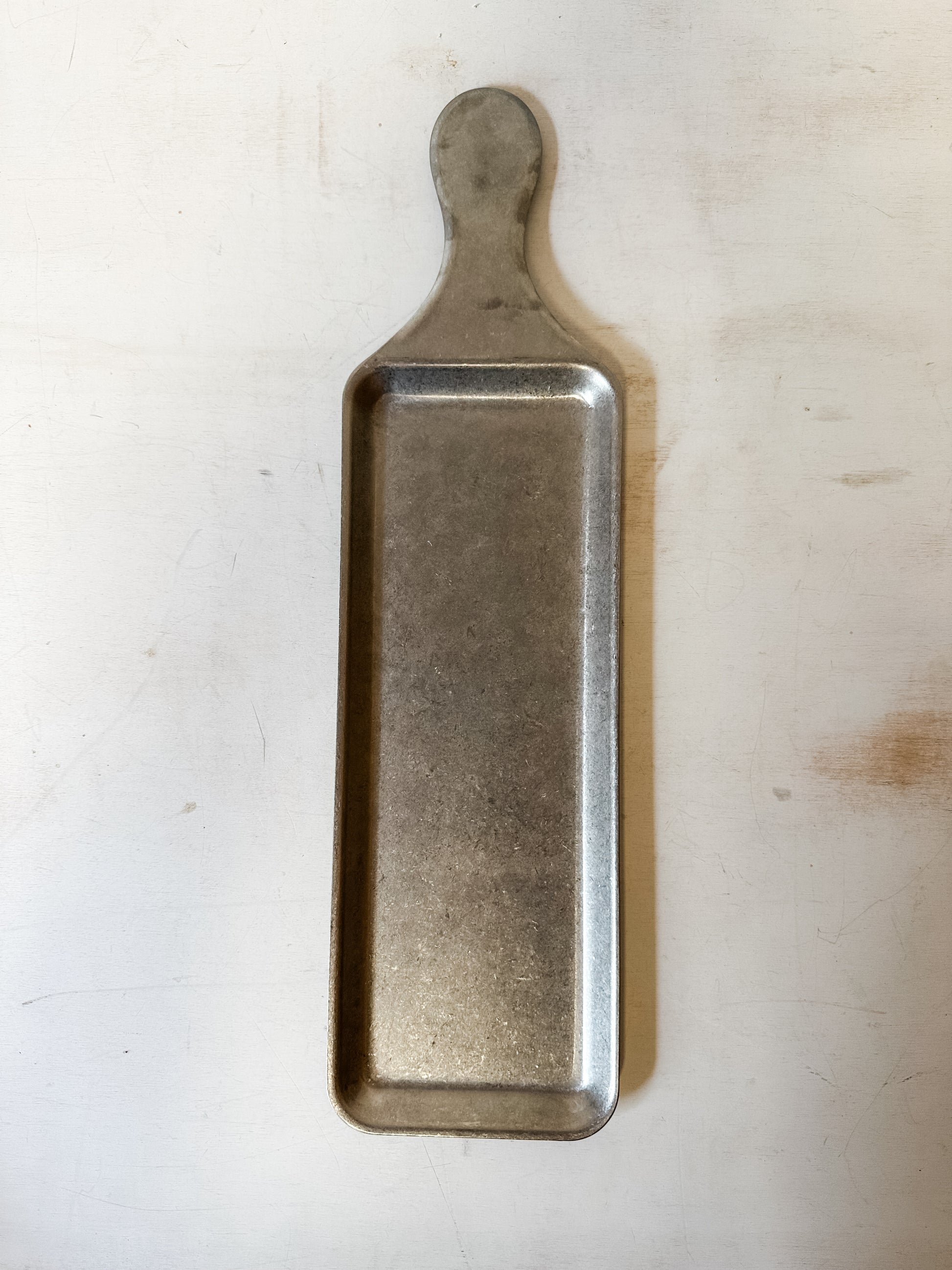 stainless steel serving tray with handle and brushed pewter finish at the Rustic Barn in Killingworth CT