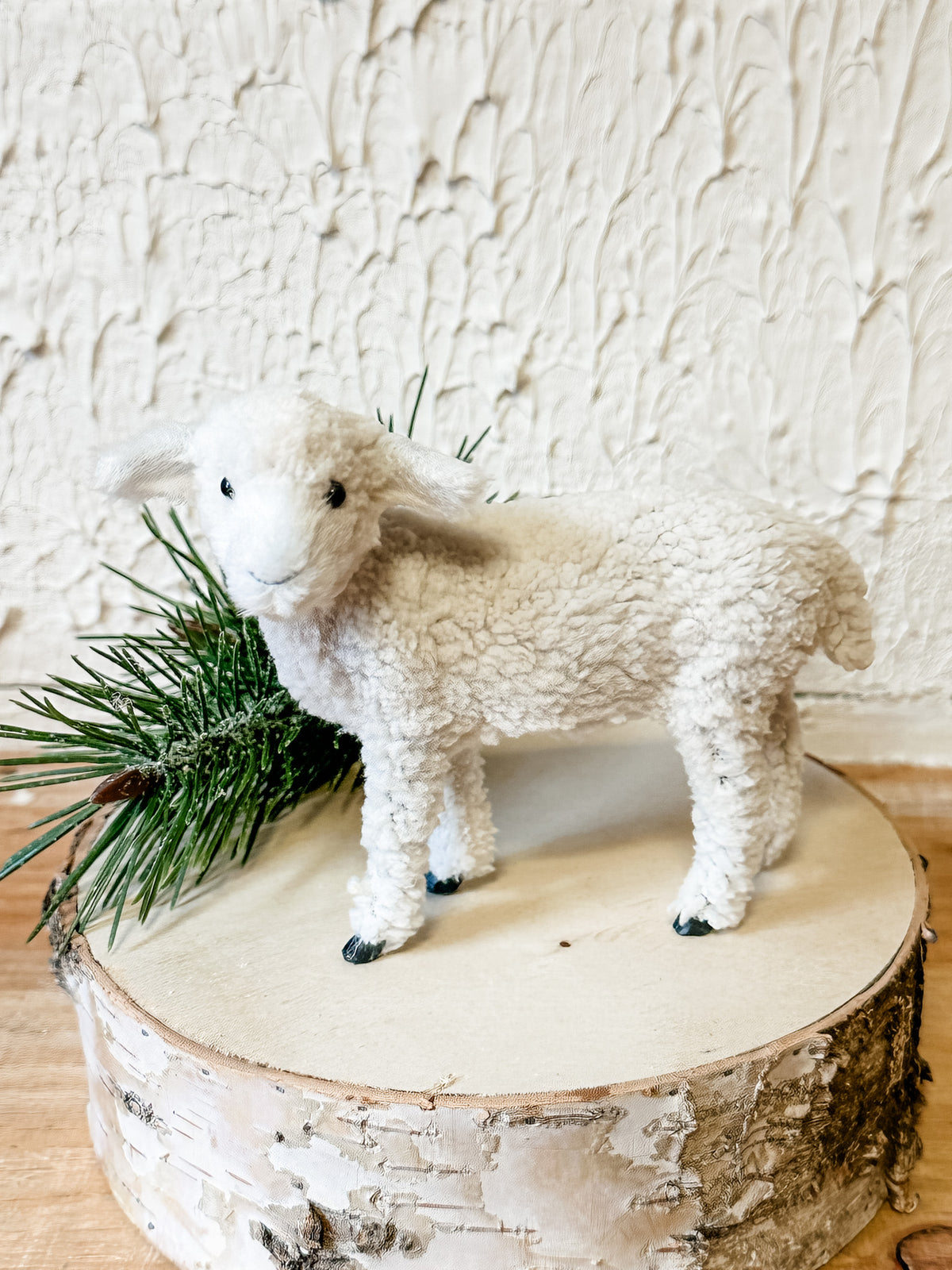 standing faux fur sheep figurine for christmas at the rustic barn in killingworth, CT