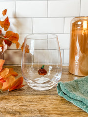 stemless wine glass with a pumpkin icon at the bottom at the rustic barn in killingworth ct