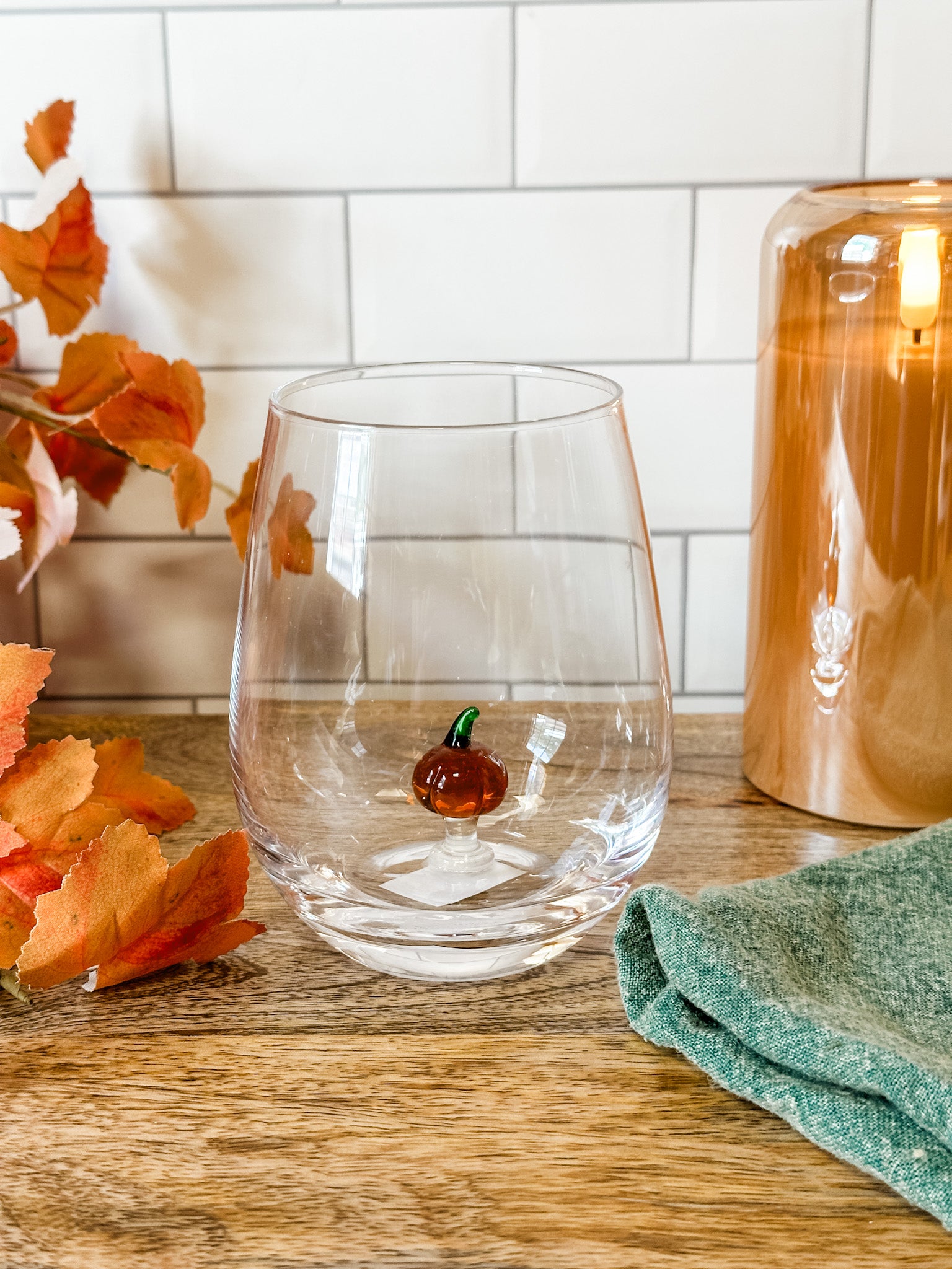 stemless wine glass with a pumpkin icon at the bottom at the rustic barn in killingworth ct