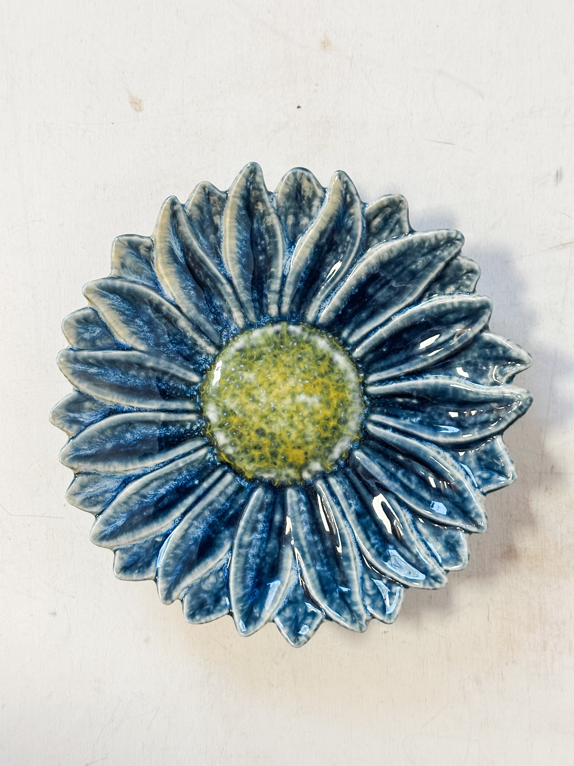 blue stoneware flower shaped dishes at The Rustic Barn in Killingworth CT