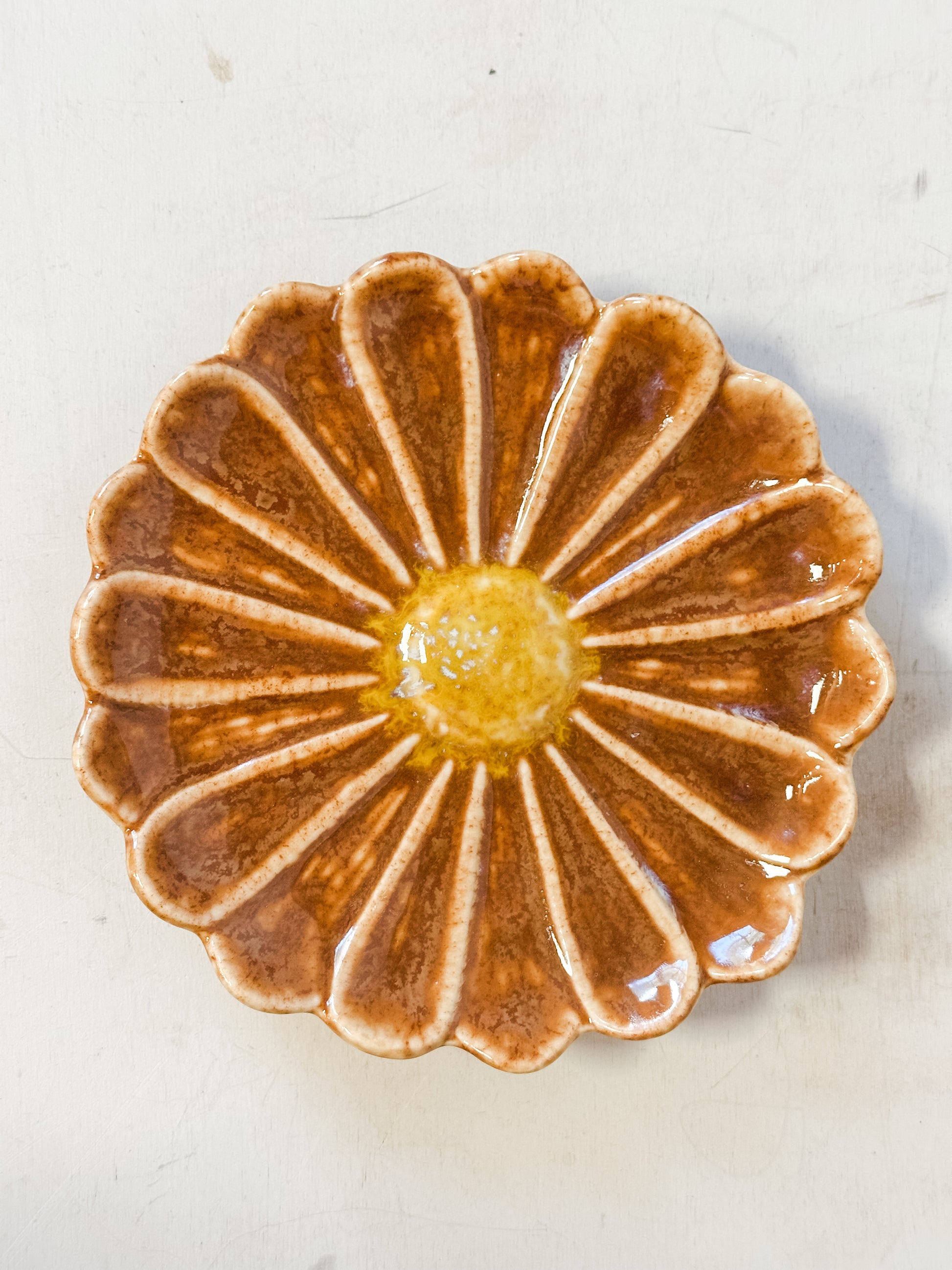 rust color stoneware flower shaped dishes at The Rustic Barn in Killingworth CT