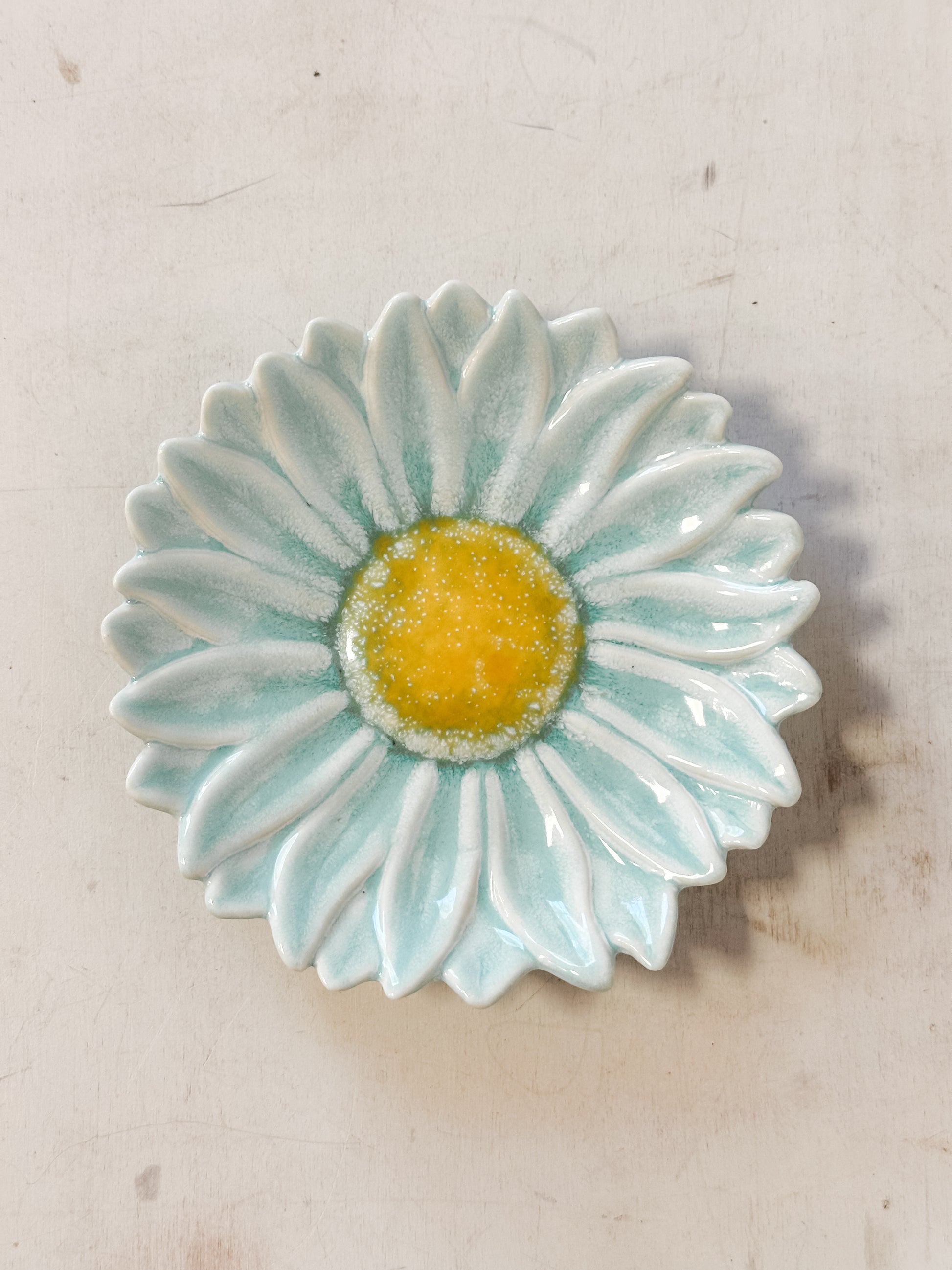 teal stoneware flower shaped dishes at The Rustic Barn in Killingworth CT