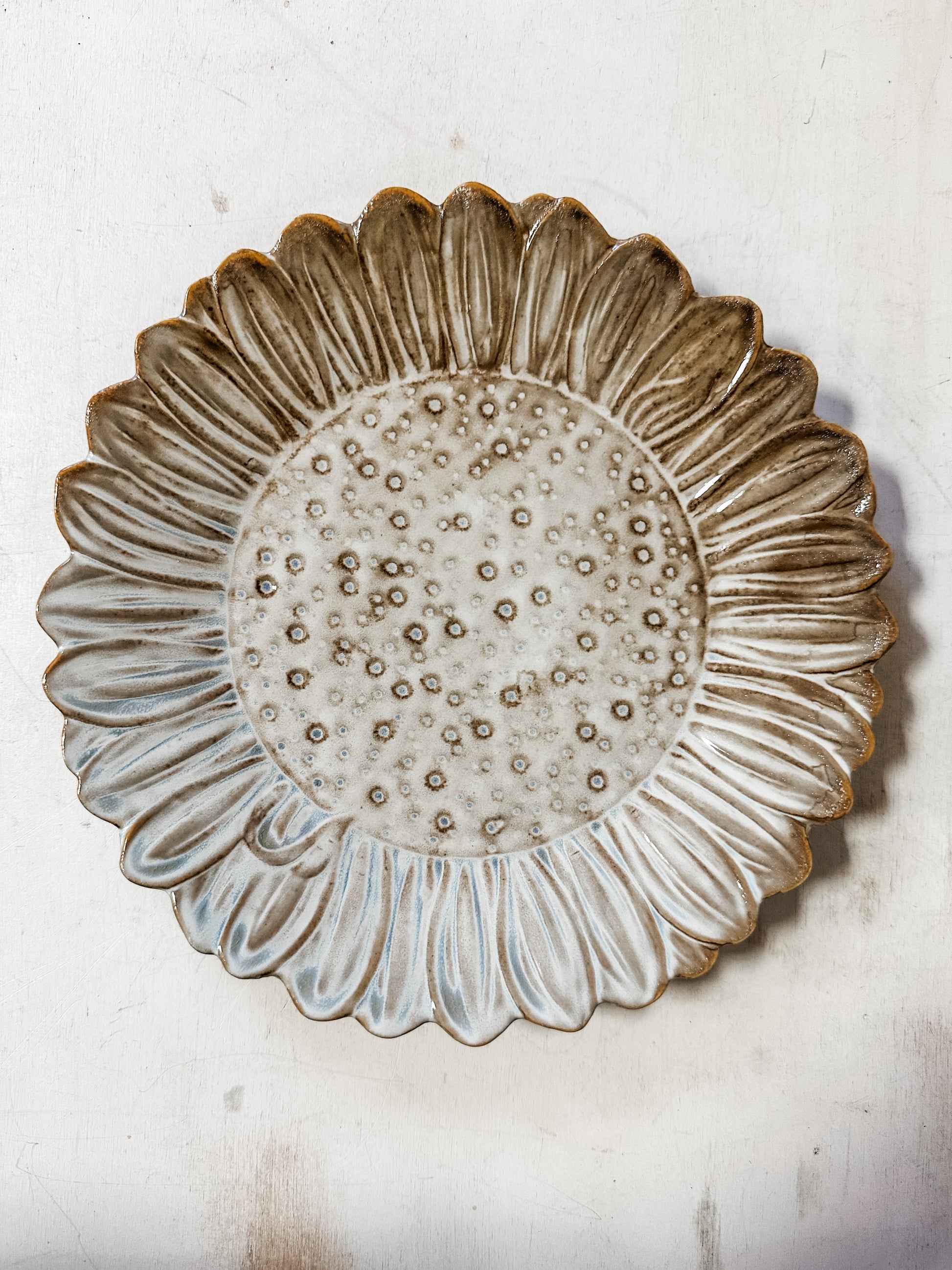 stoneware flower shaped plate at The Rustic Barn in Killingworth, CT