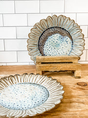 stoneware flower shaped plate at the rustic barn in killingworth ct