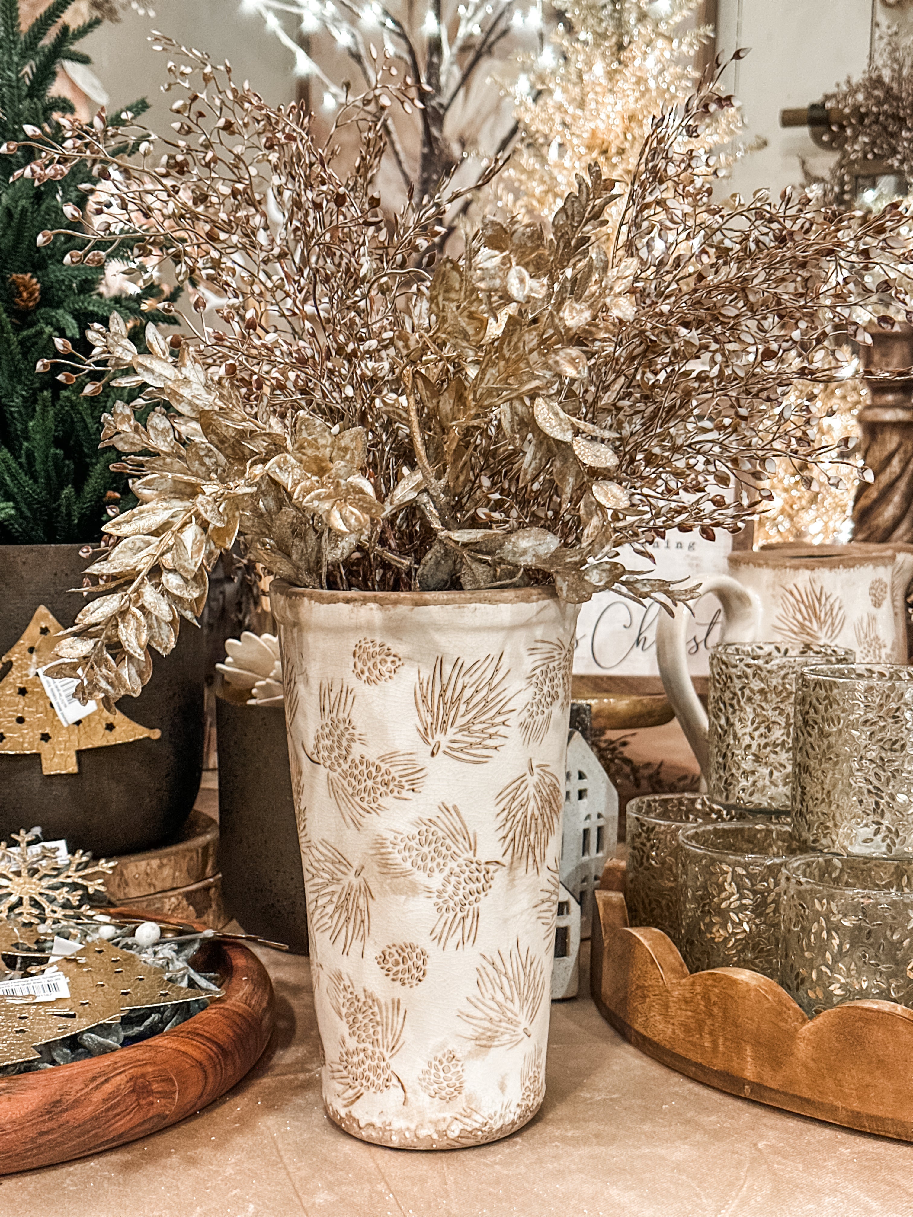stoneware vase with evergreen boughs and pinecone pattern at The Rustic Barn in Killingworth CT