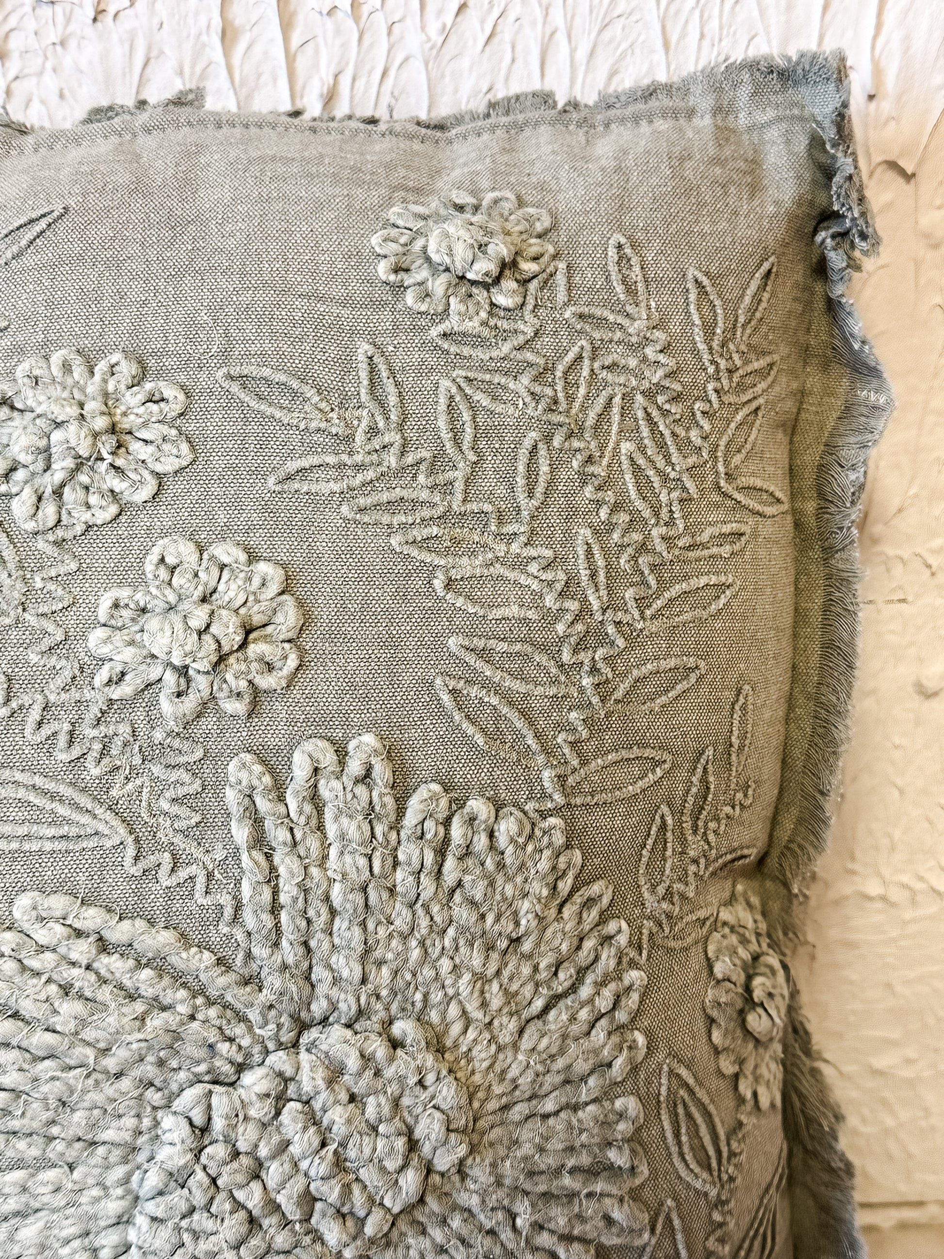 stonewashed green embroidered flower pillow at The Rustic Barn in Killingworth, CT