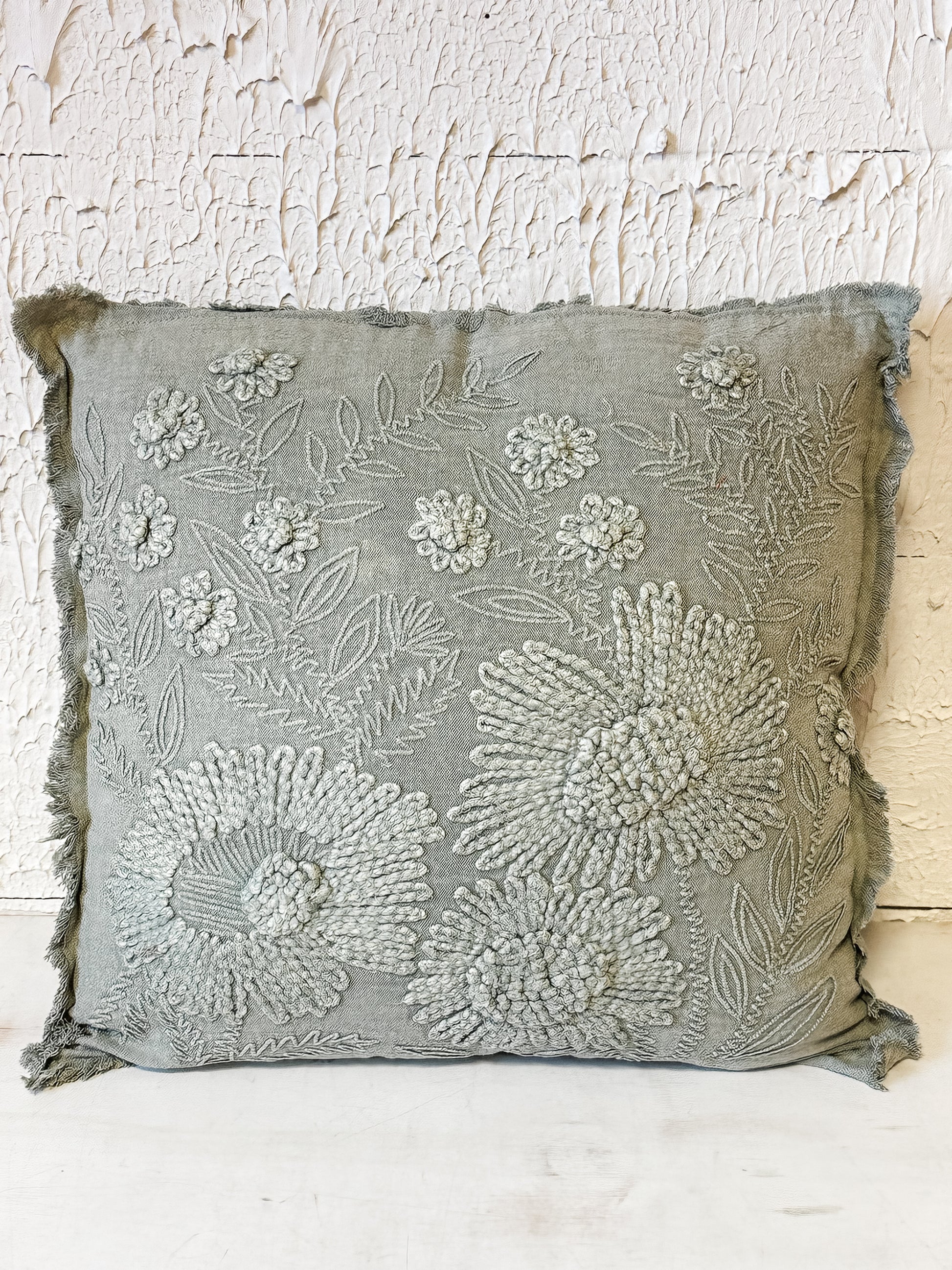 stonewashed green embroidered flower pillow at The Rustic Barn in Killingworth, CT