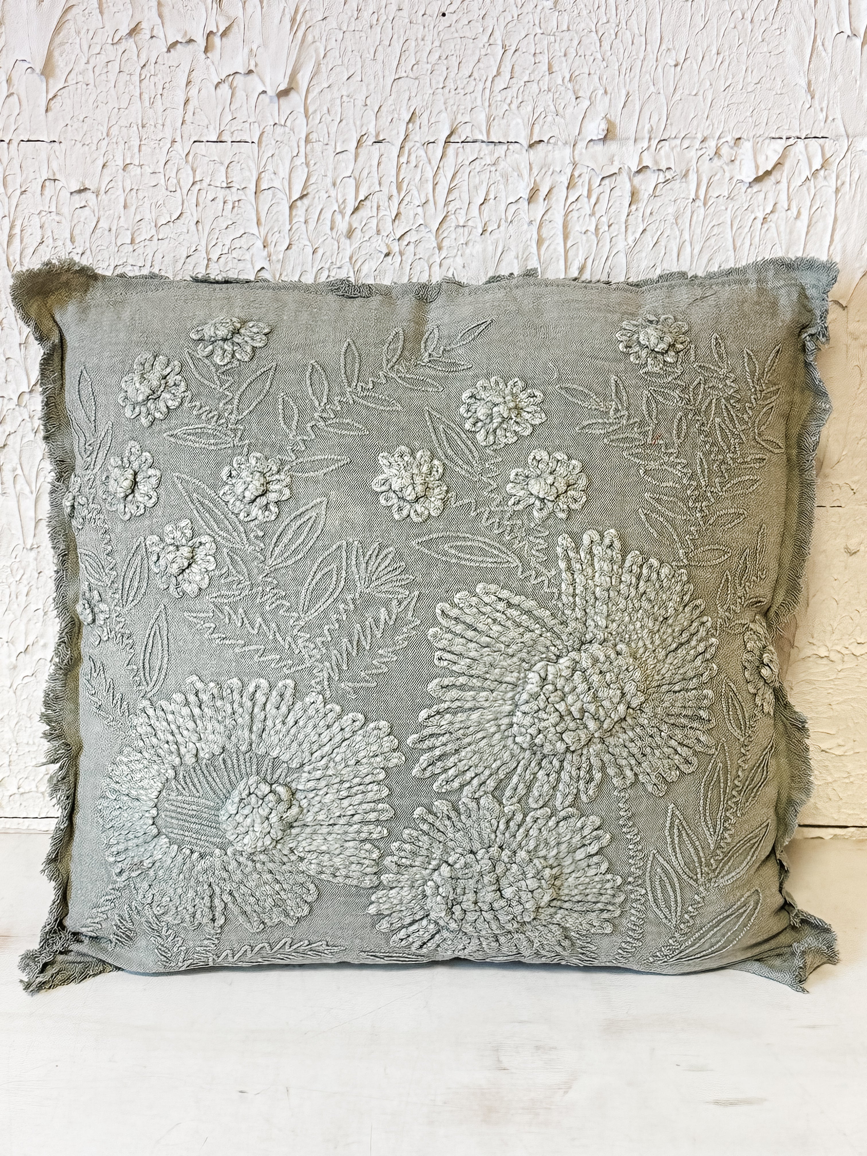 stonewashed green embroidered flower pillow at The Rustic Barn in Killingworth, CT
