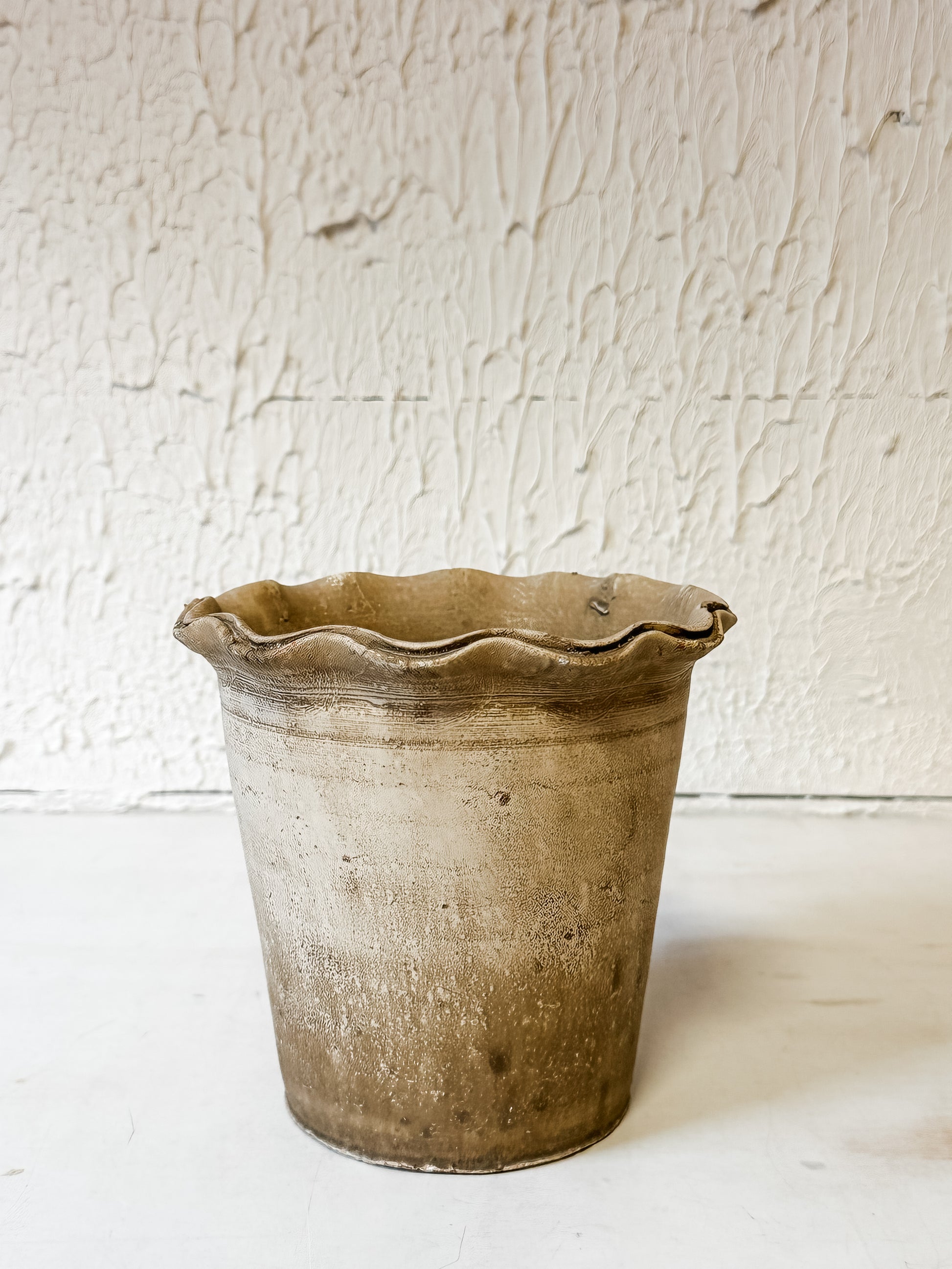 terra-cotta planter with scalloped edge and distressed finish at The Rustic Barn in Killingworth CT