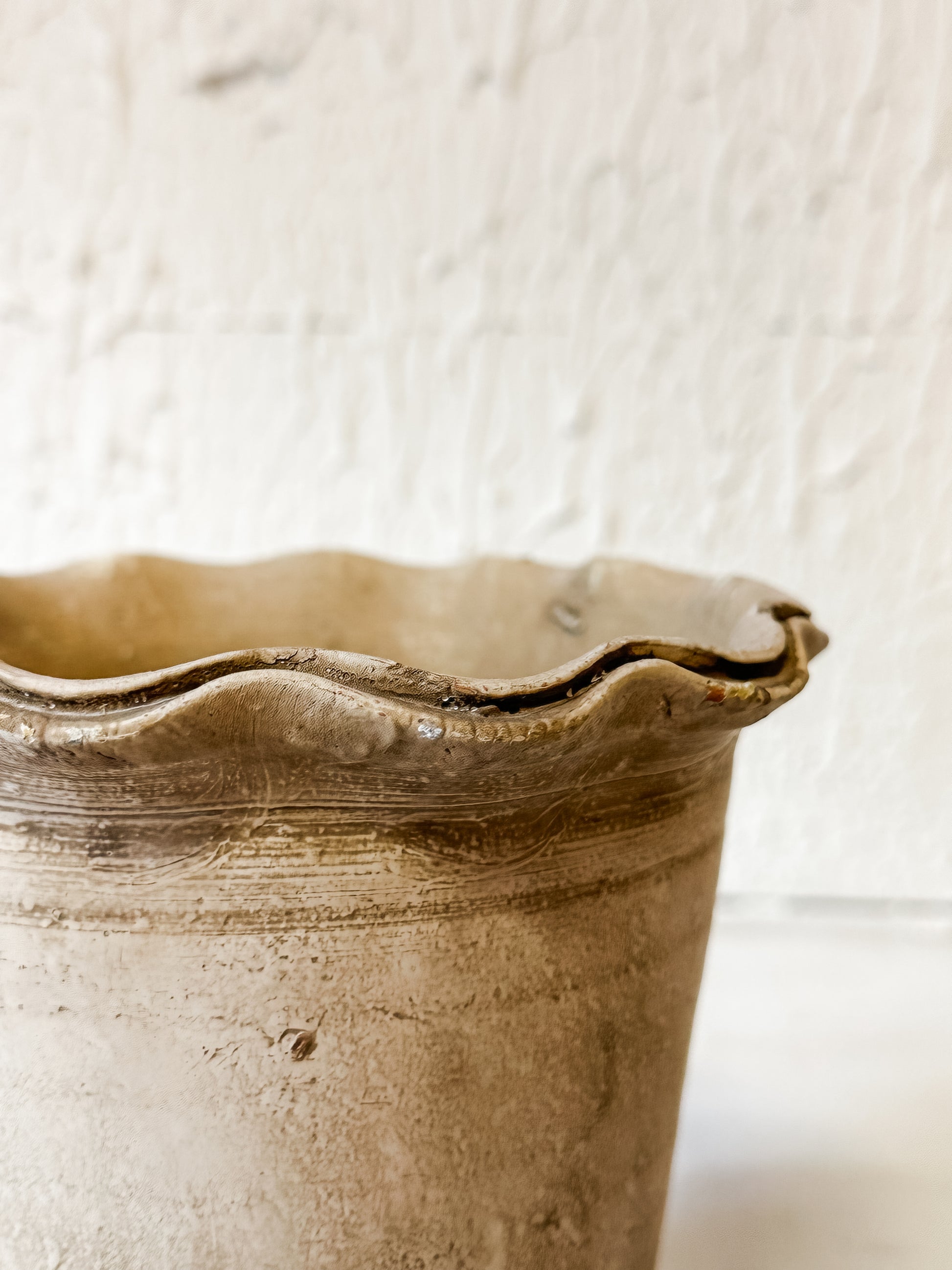 terra-cotta planter with scalloped edge and distressed finish at The Rustic Barn in Killingworth CT