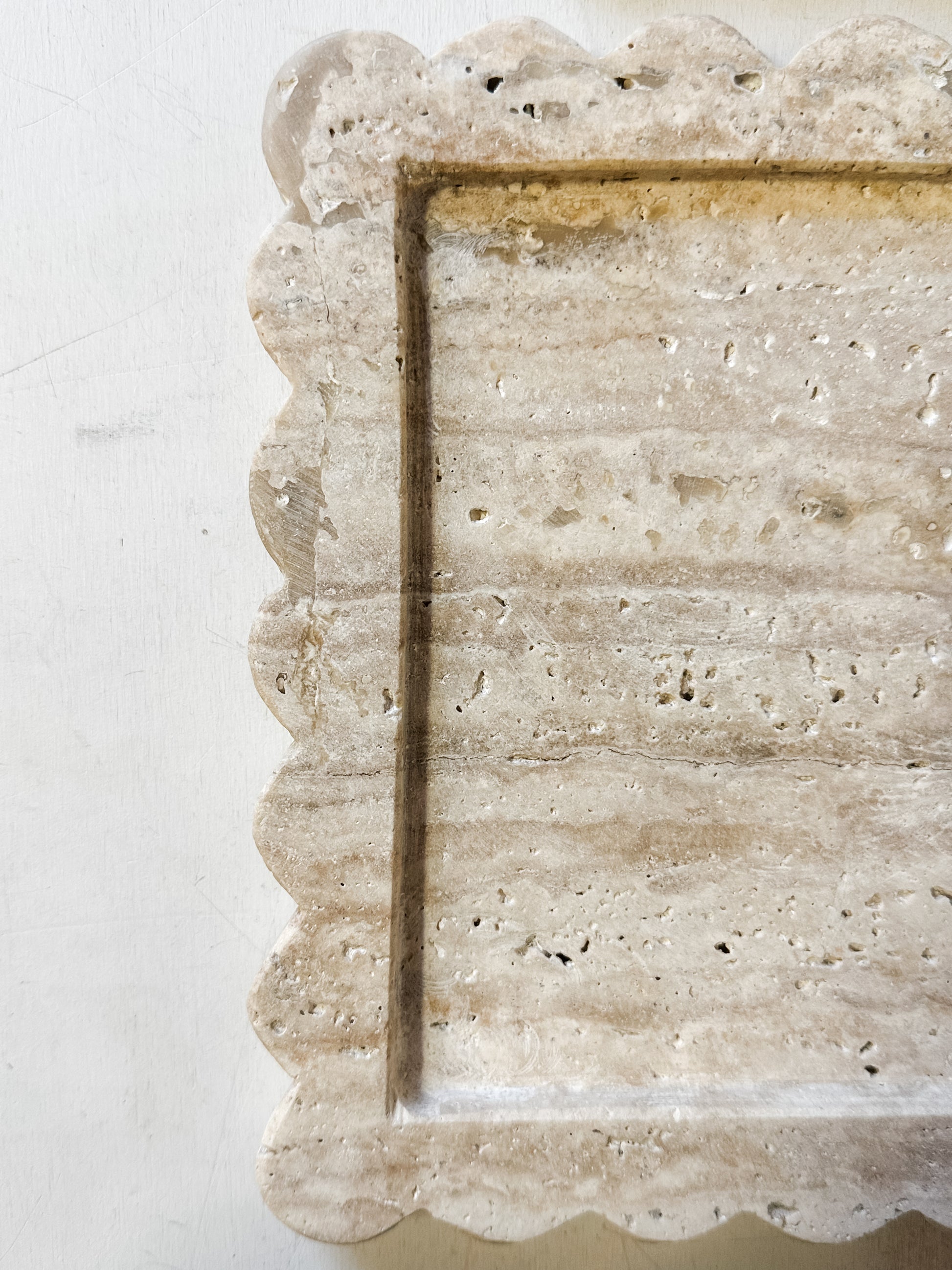 travertine trays with scalloped edges at The Rustic Barn in Killingworth, CT