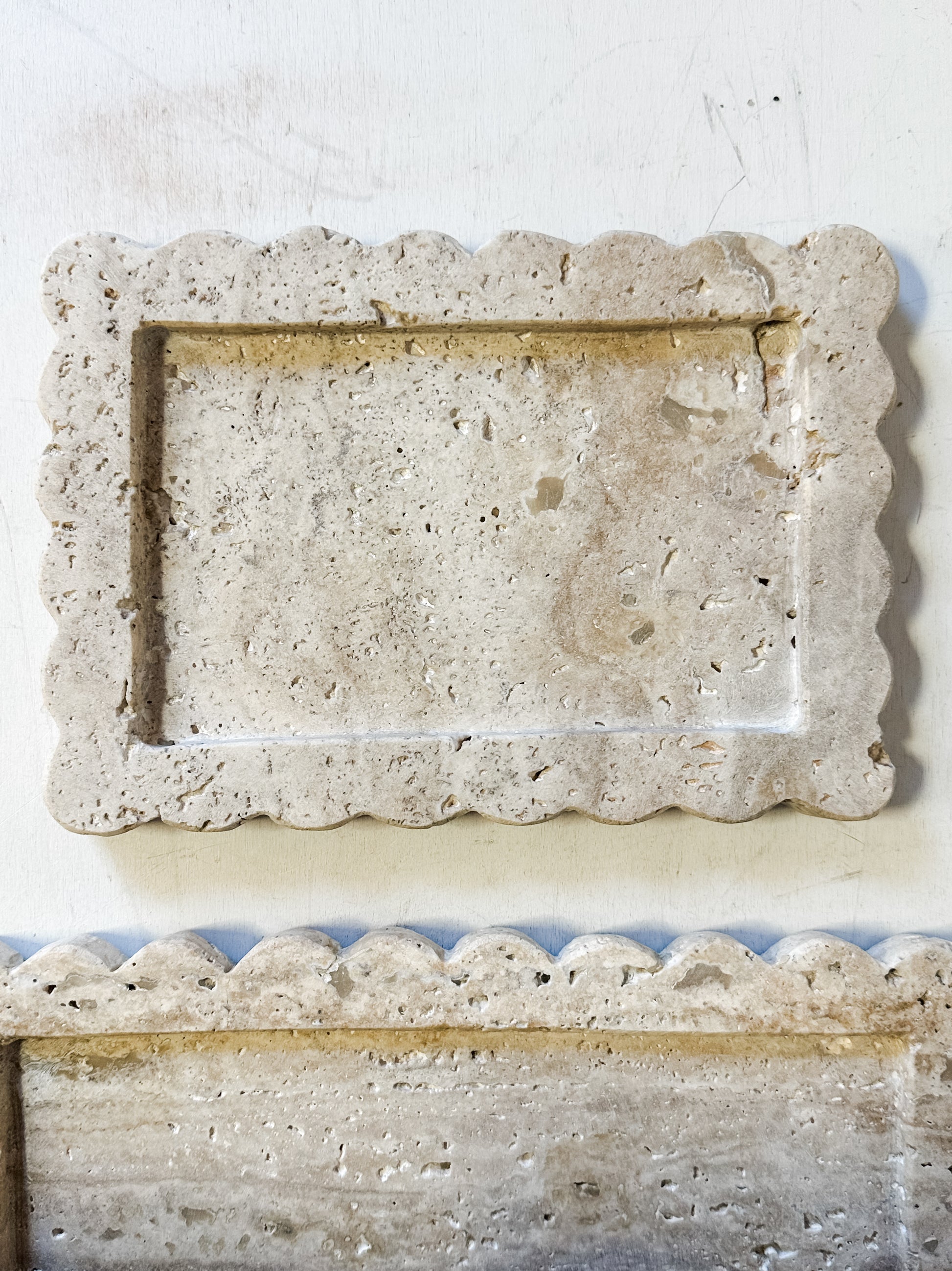 travertine trays with scalloped edges at The Rustic Barn in Killingworth, CT