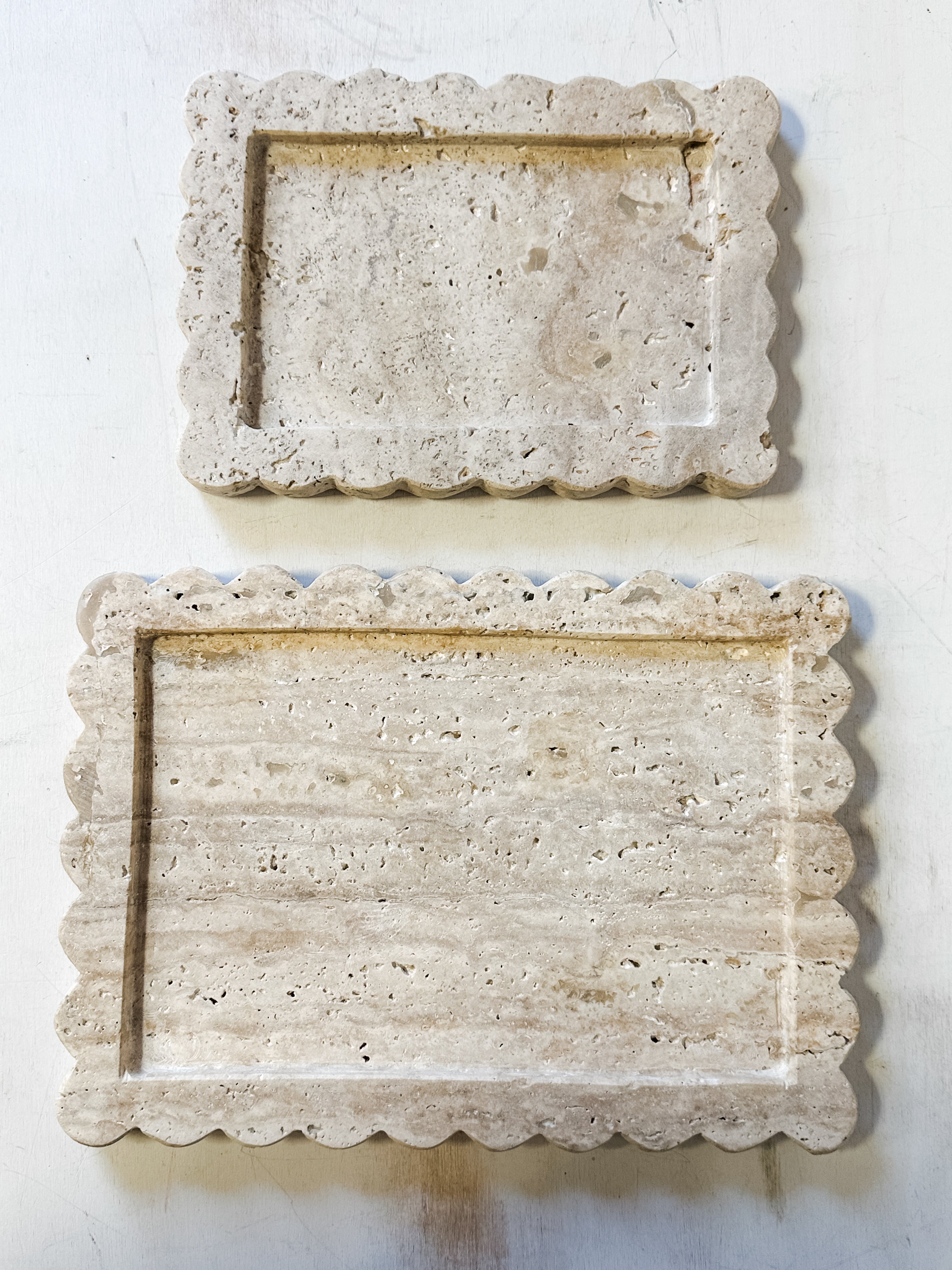 travertine trays with scalloped edges at The Rustic Barn in Killingworth, CT