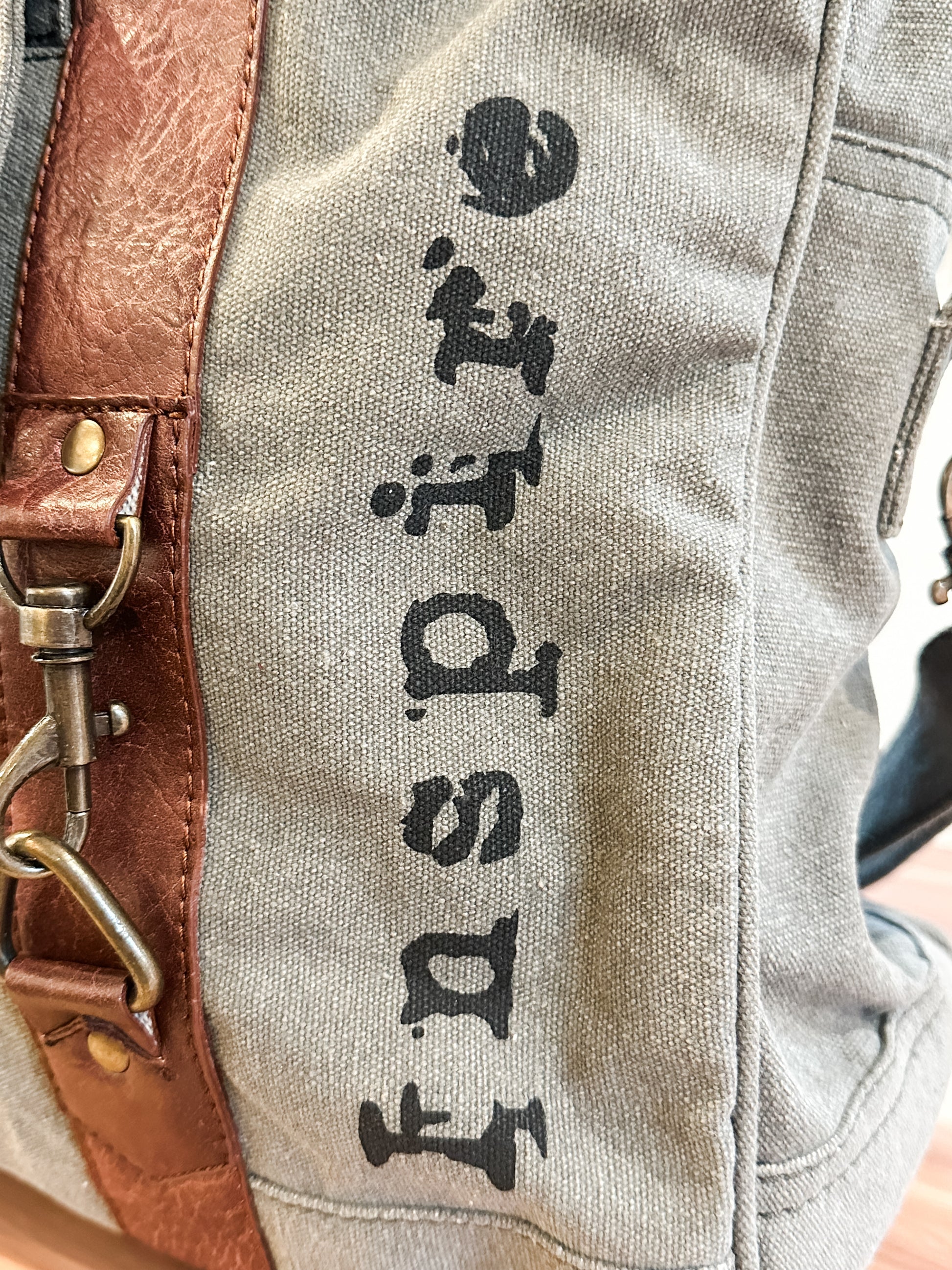 up-cycled canvas weekender bag with inspiring words at the Rustic Barn in Killingworth, CT