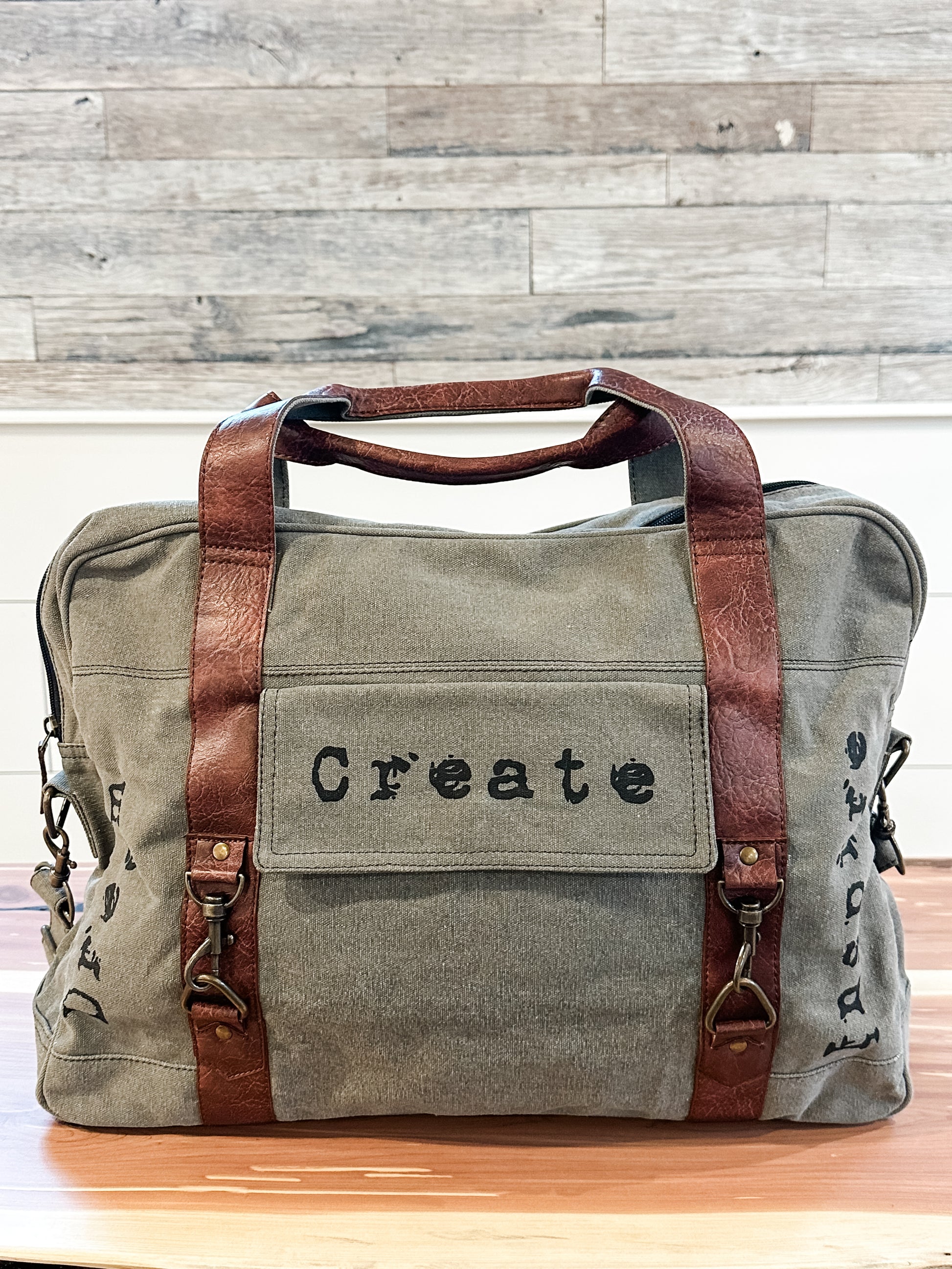 up-cycled canvas weekender bag with inspiring words at the Rustic Barn in Killingworth, CT